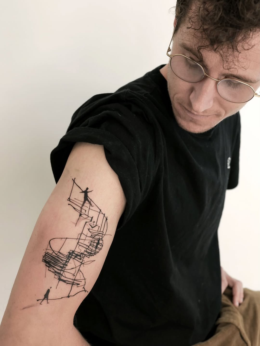 Abstract architectural sketch with figures sketch tattoo on the forearm by 초현실과 현실 그 사이를 그리다.