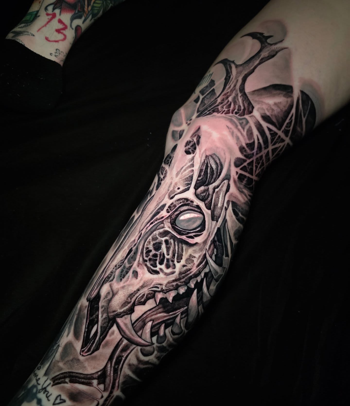 Cyborg skull dark realism tattoo on the forearm by Kelsey Lorrae, Ankeny, Iowa
