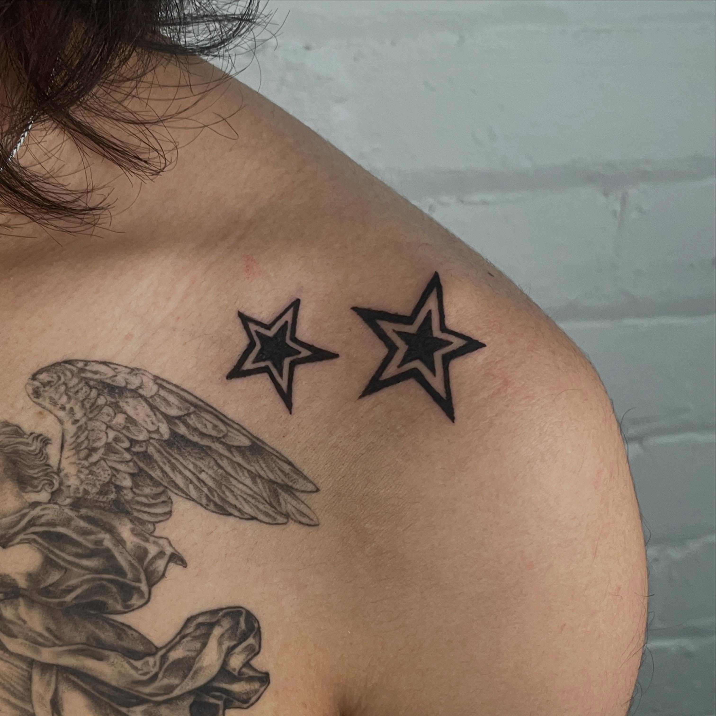 Stars black and grey tattoo on the shoulder by Koreatattoo Seoultattoo hongdaetattoo 서울타투