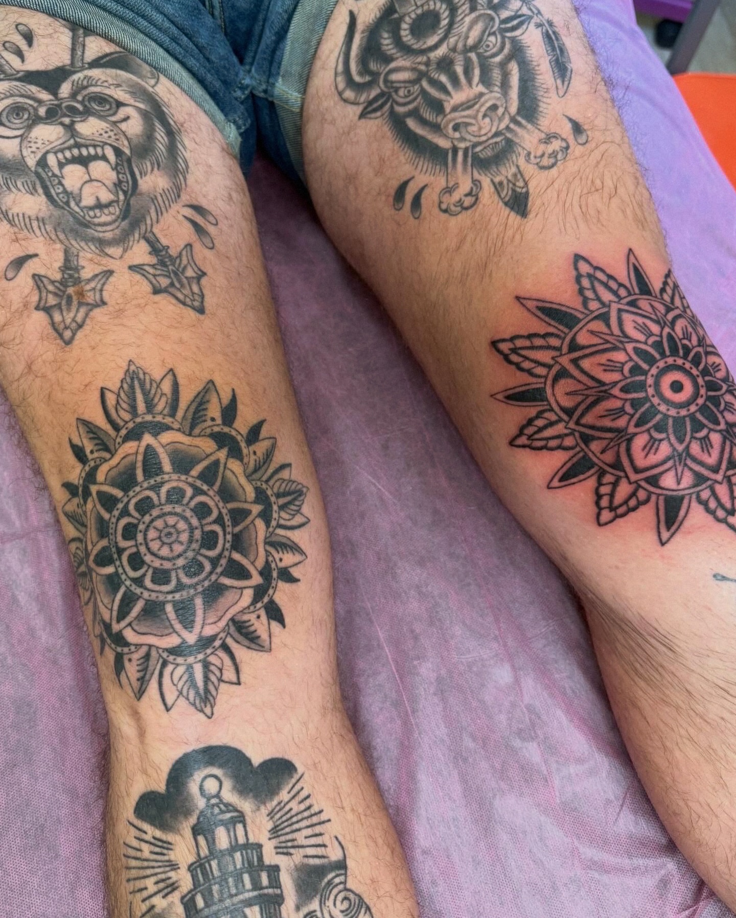 Mandala black and grey tattoo on the thigh by charlie