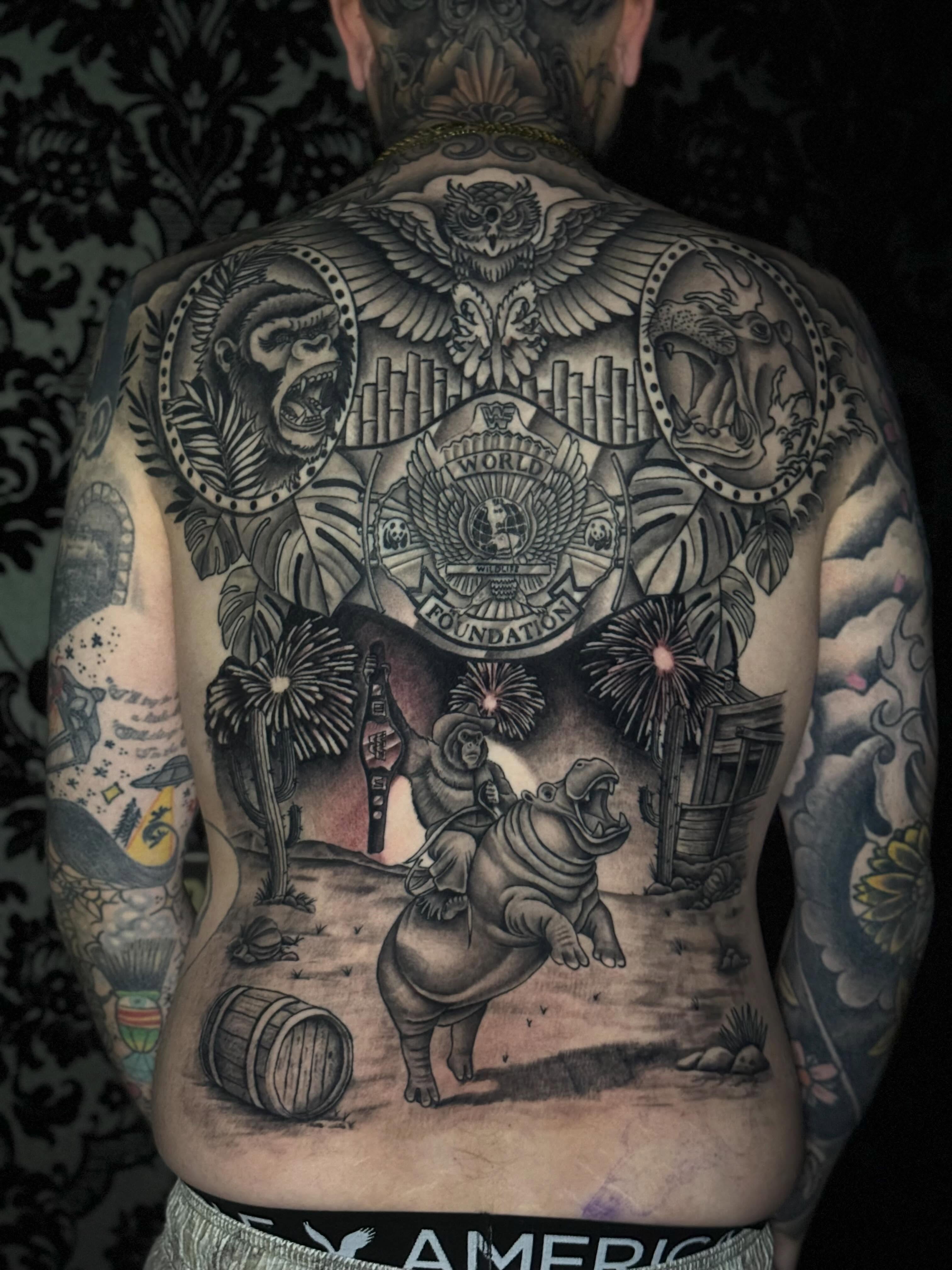 Jungle scene American traditional tattoo on the back by Jacob Bettker, Centerville, Ohio