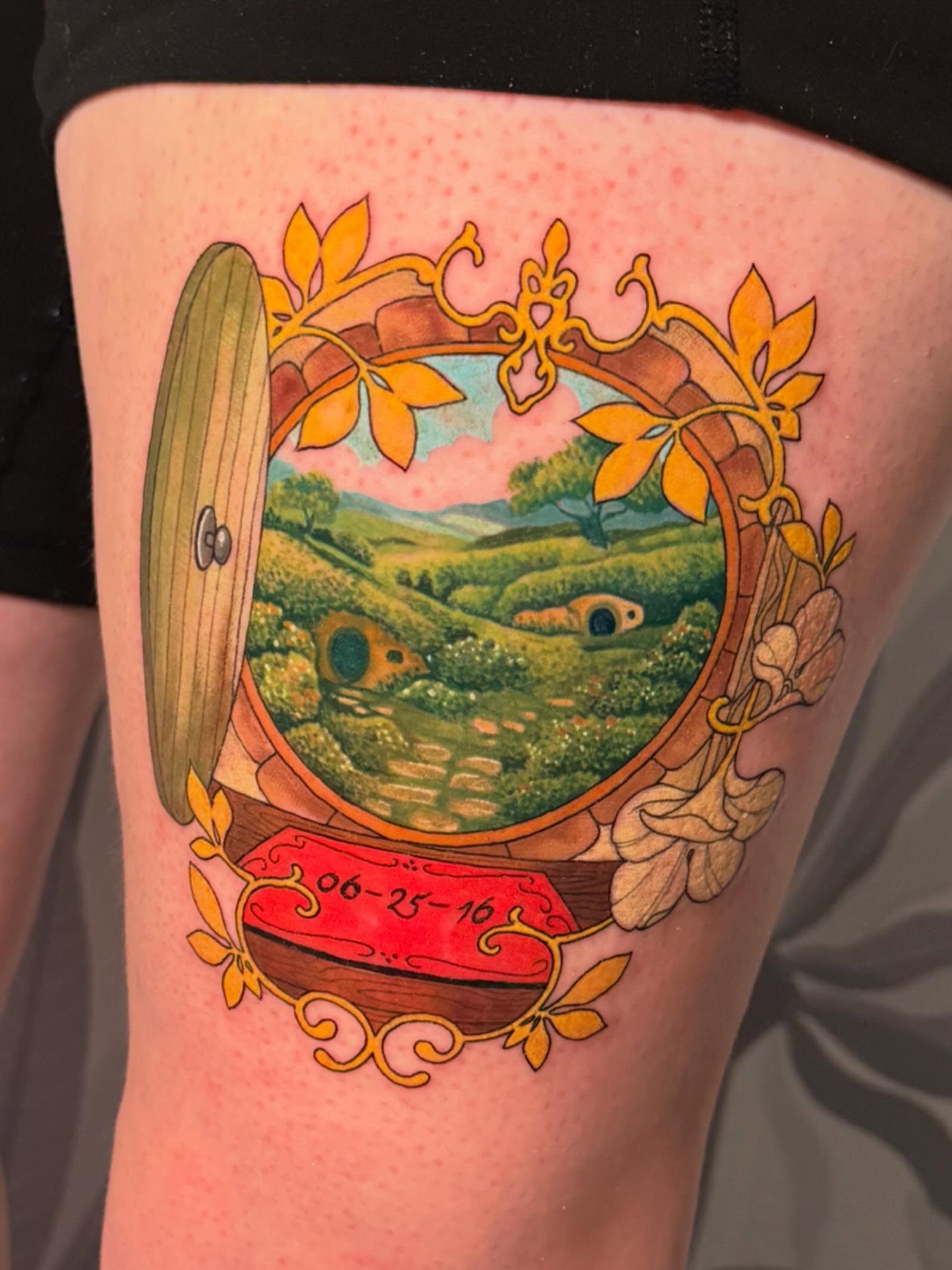 Hobbit hole landscape illustrative tattoo on the thigh by Connie Fiorino - Tattoo Artist