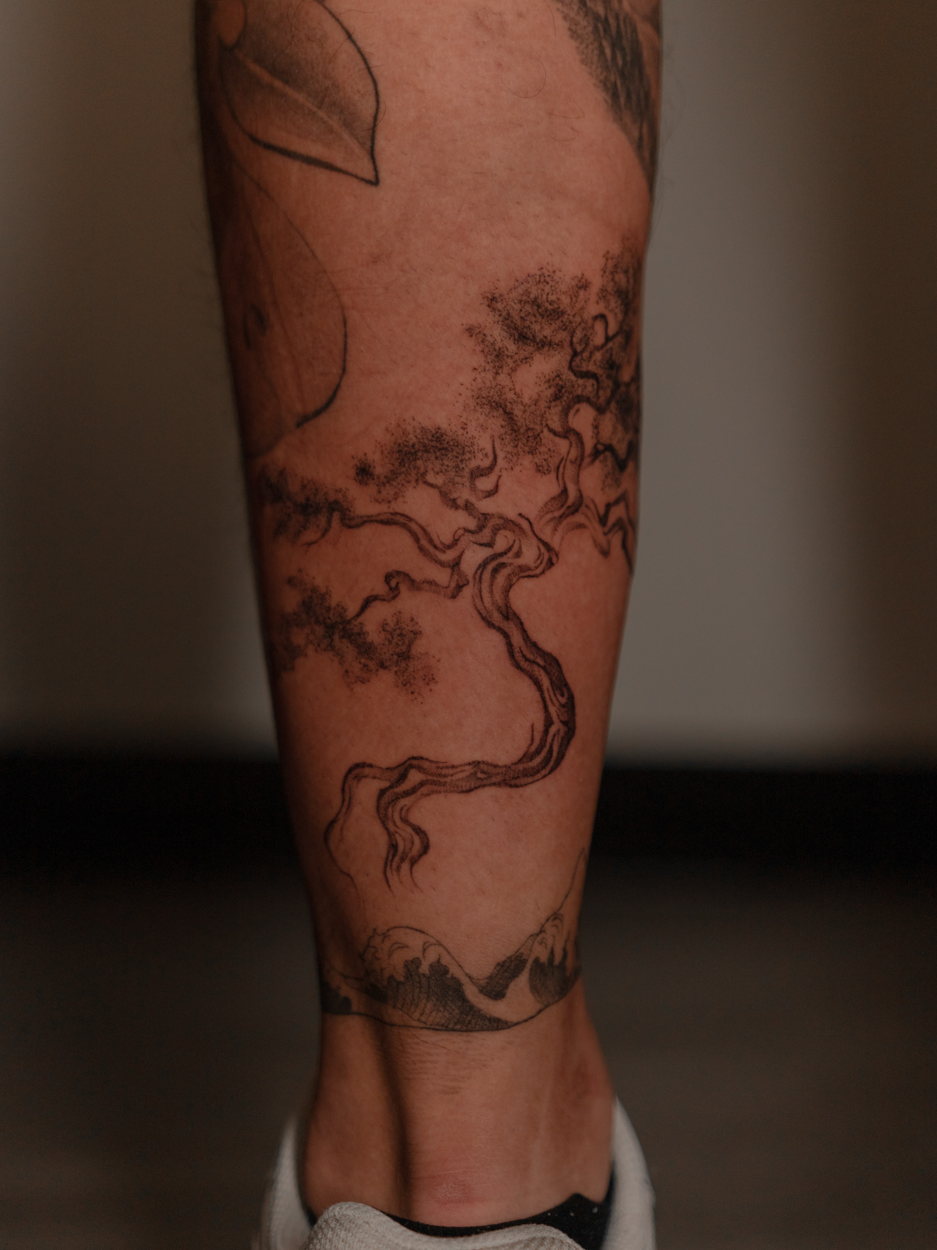 Tree dotwork tattoo on the calf by Jen- San Antonio tattoo artist