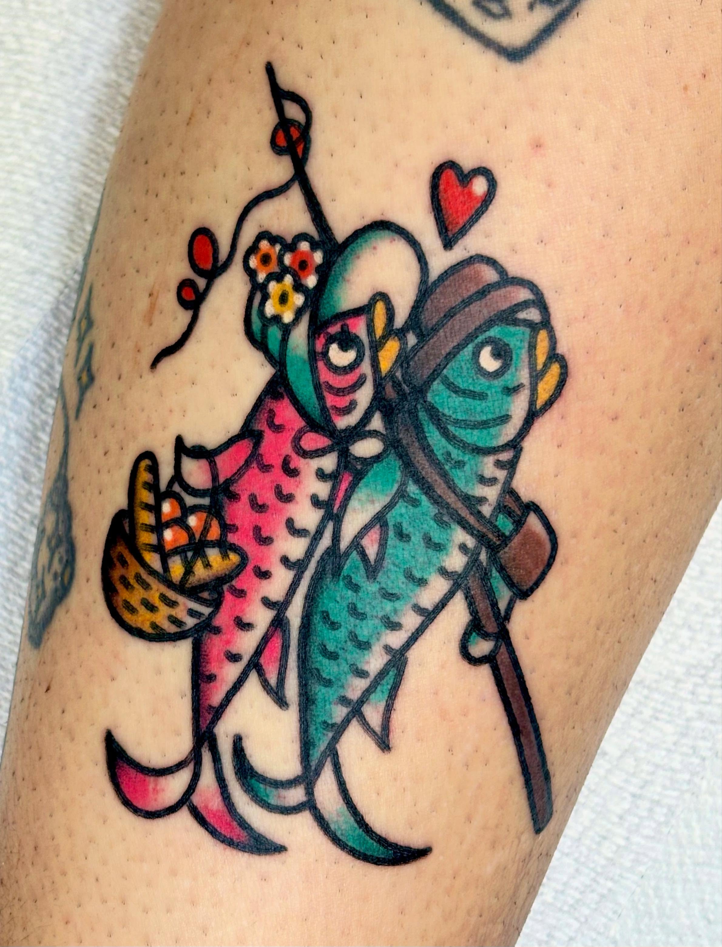 Koi fish couple American traditional tattoo on the thigh by @rutattoos
