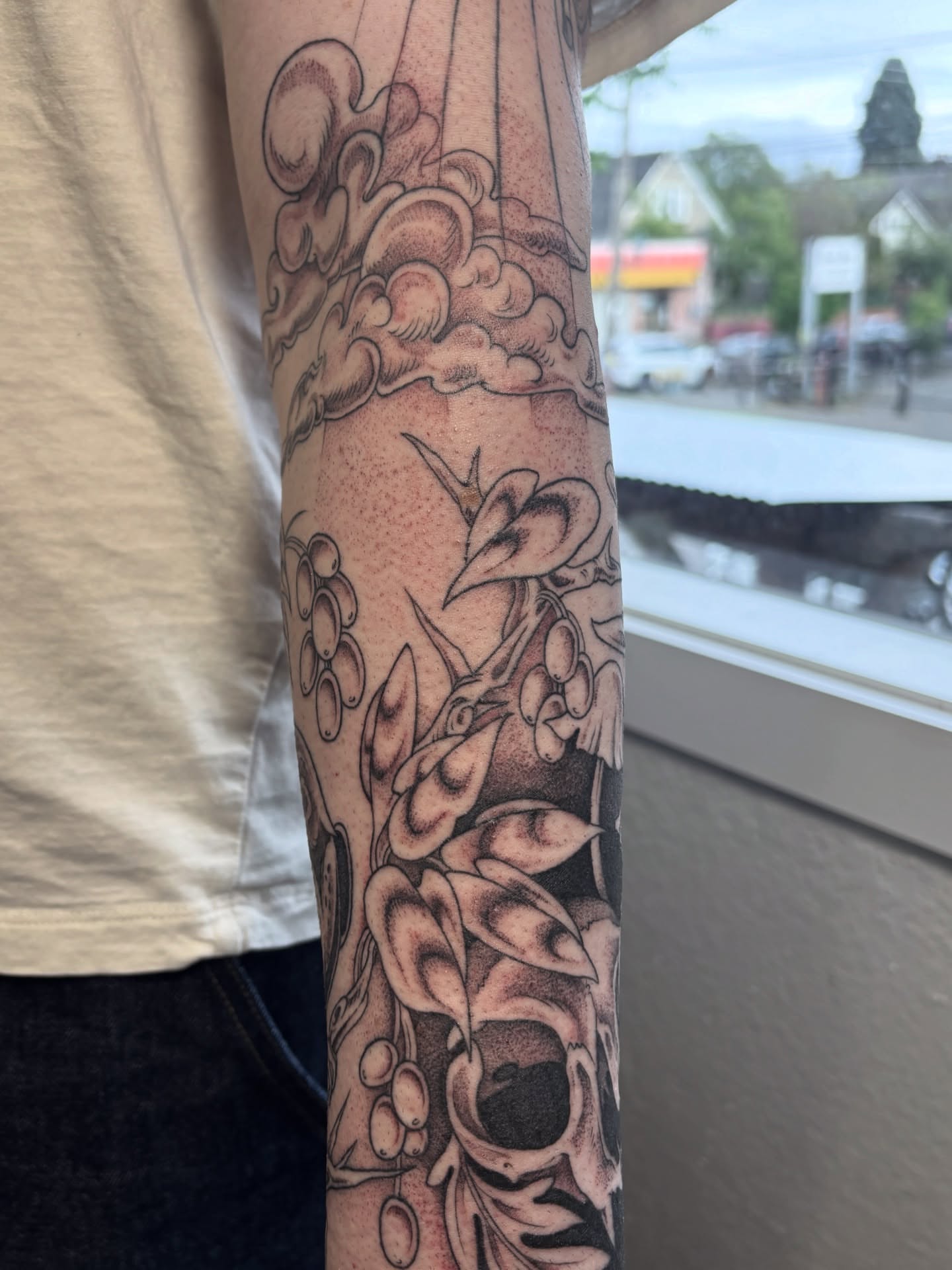 Floral arrangement dotwork tattoo on the forearm by katie, Seattle, Washington