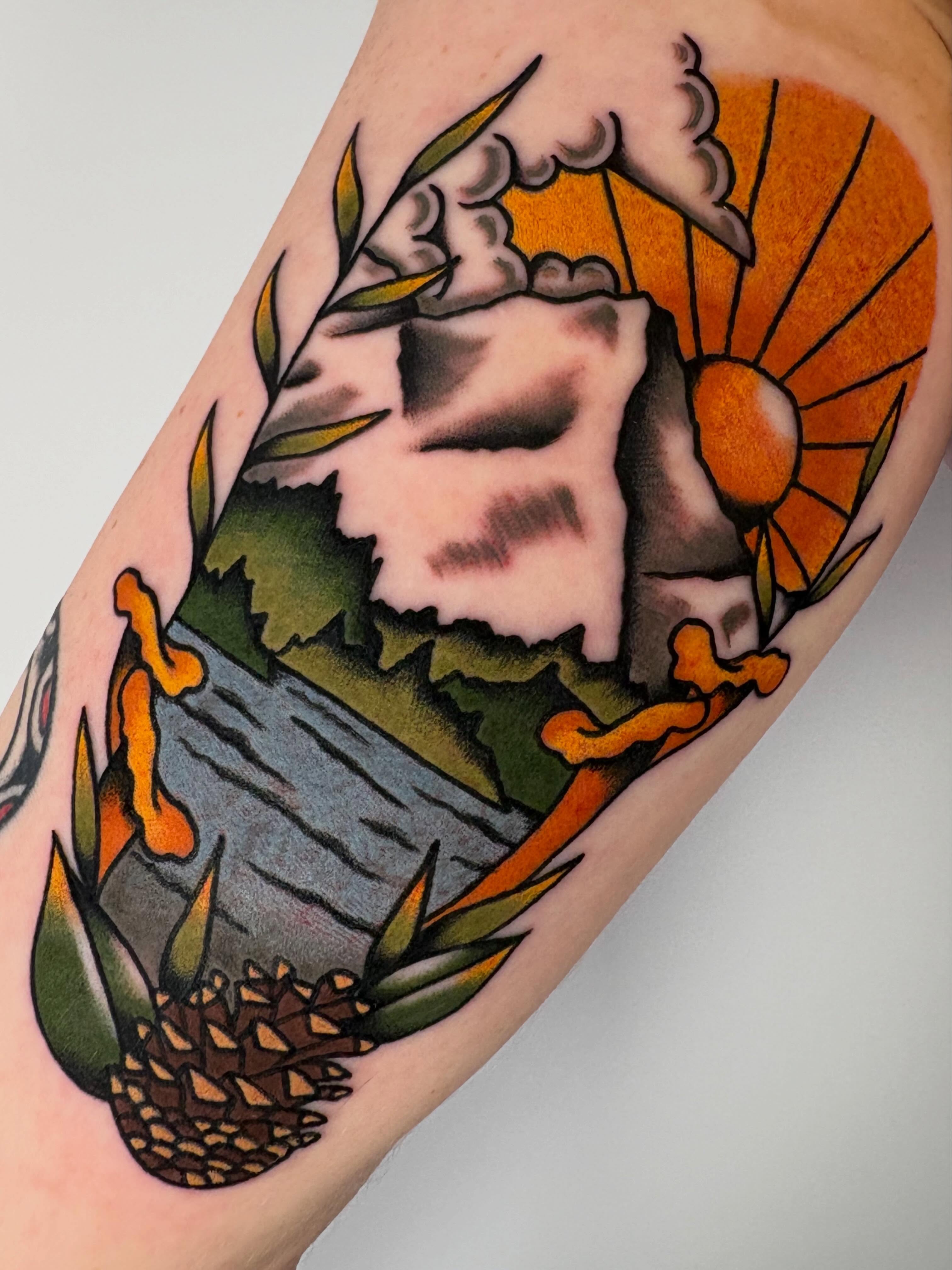 Mountain landscape American traditional tattoo on the forearm by Lorelei