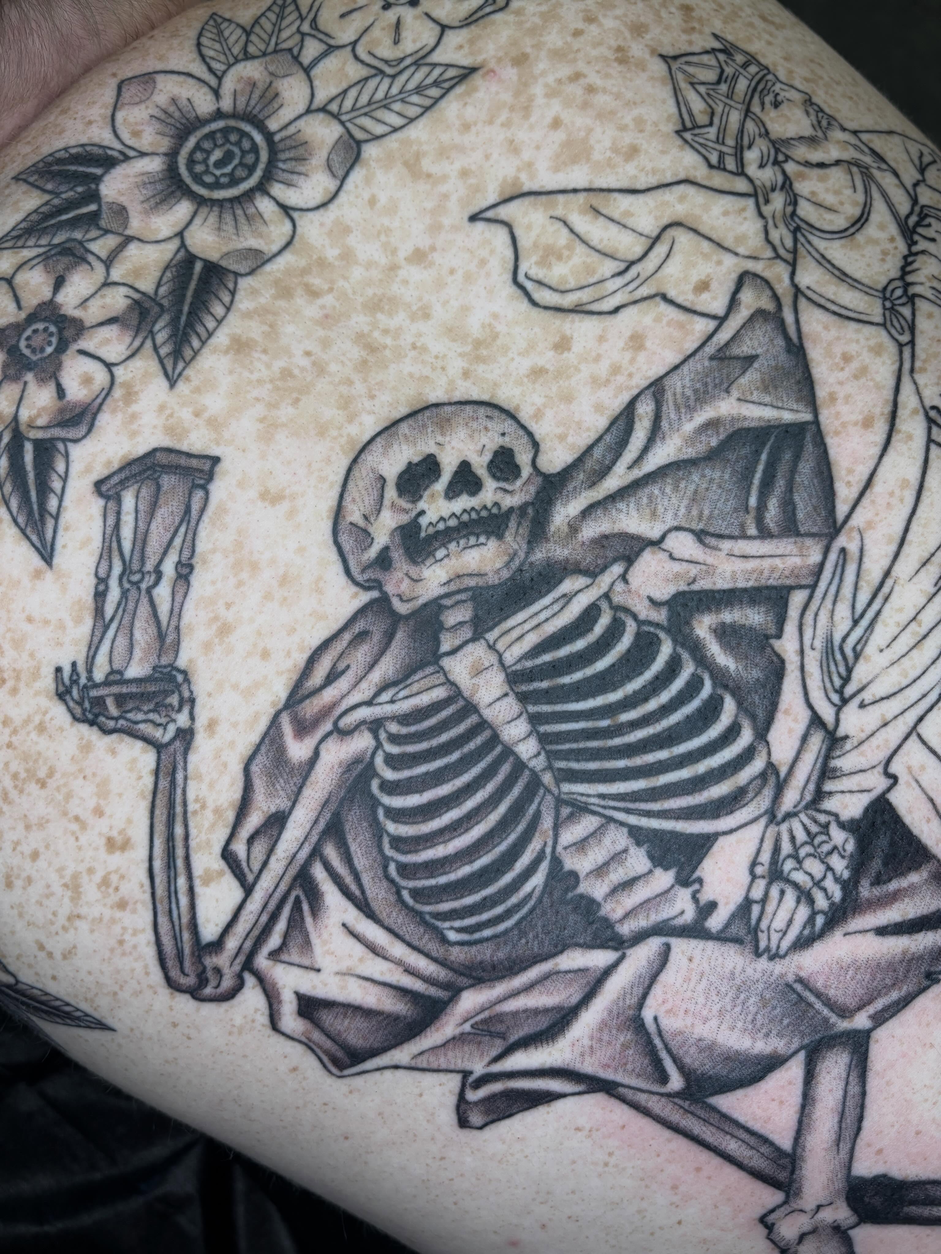 Skeleton with hourglass realism tattoo on the torso by Amelia Rose, Los Angeles, California