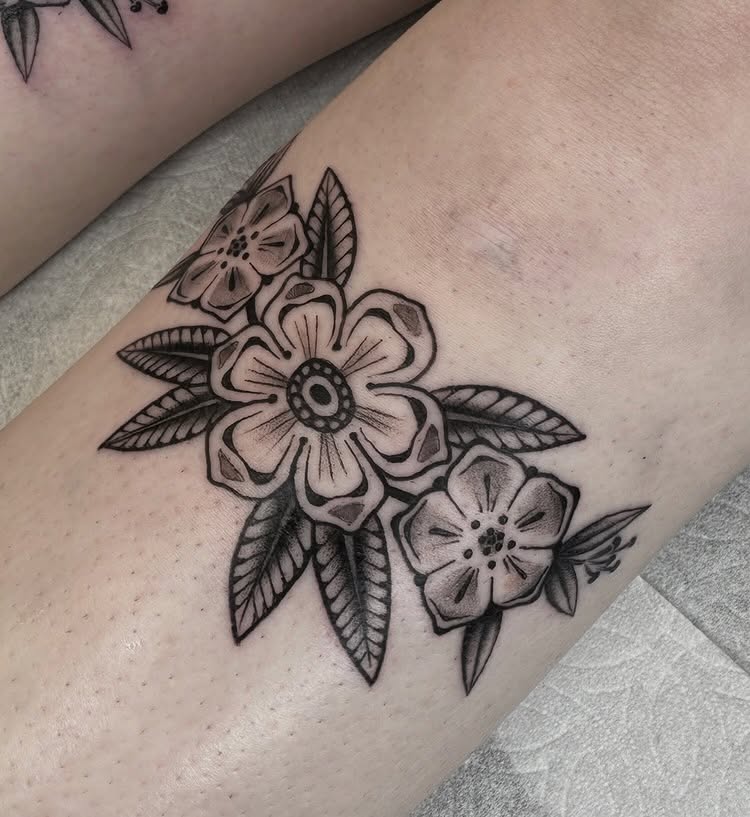 Flower bouquet black and grey tattoo on the forearm by Amelia Rose, Los Angeles, California