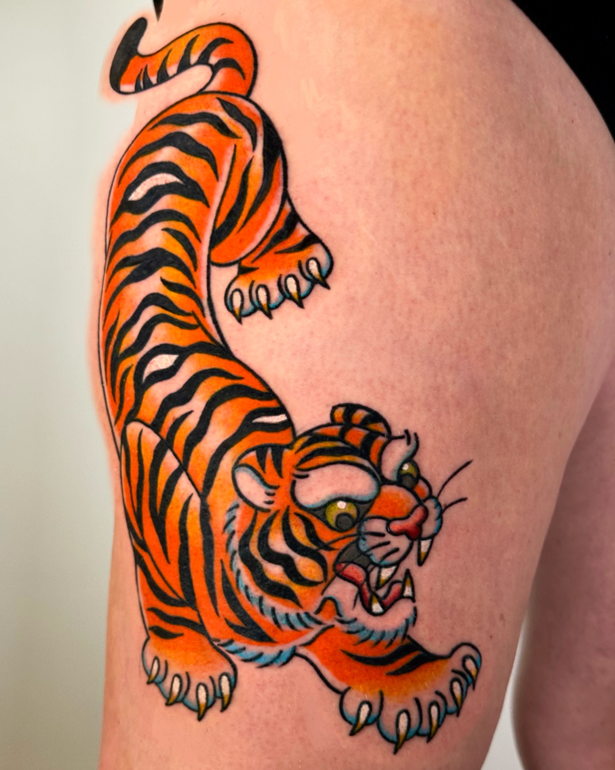 Tiger American traditional tattoo on the thigh by Ash Gonzalez ❤️ Austin Tattoo Artist