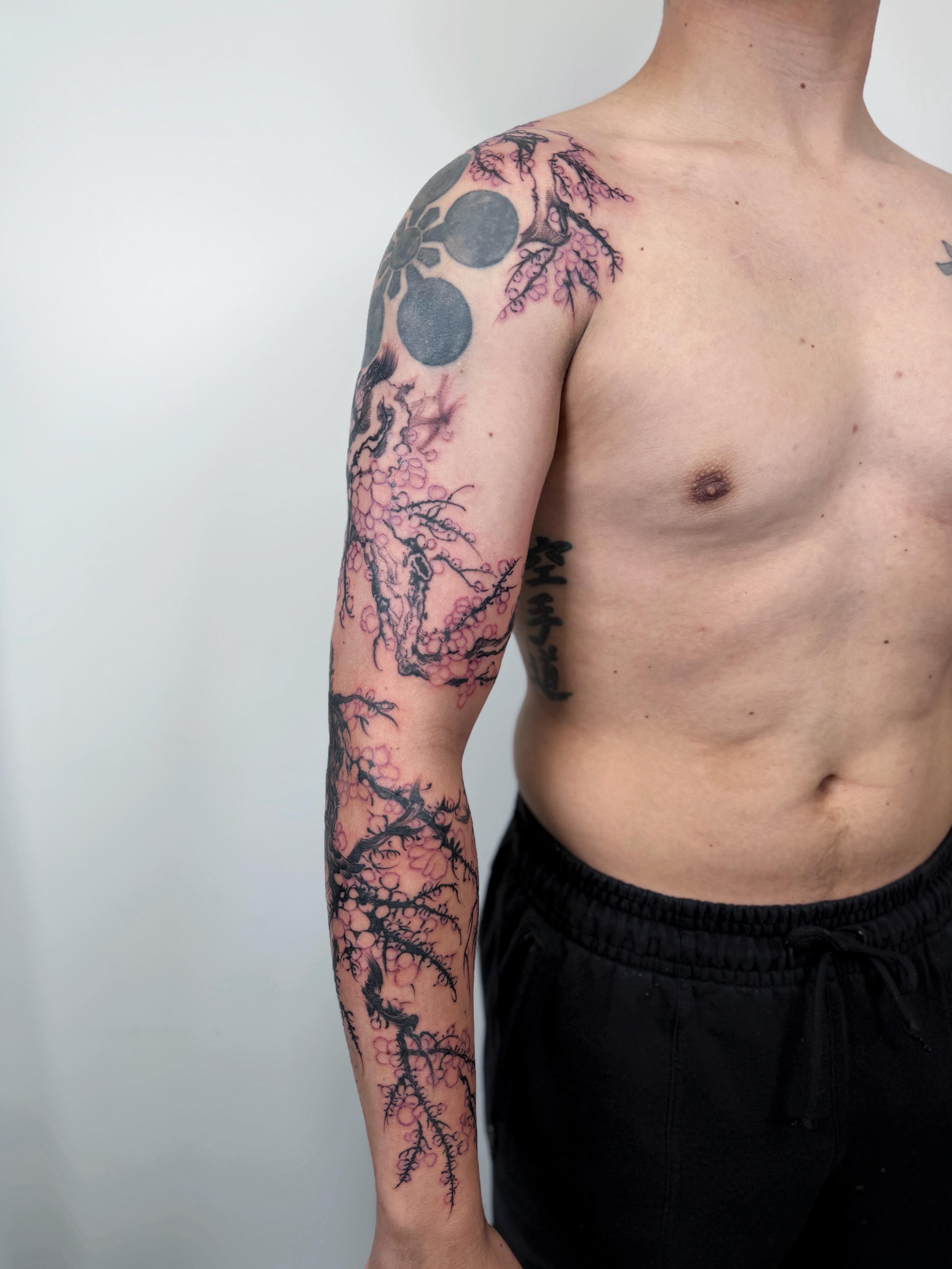 Cherry blossom tree japanese irezumi tattoo on the upper arm by Jiang_Tattooer