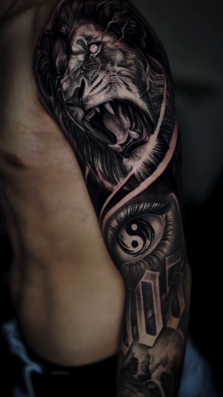 Tattoo by @angelo_tattooink — realism, black_and_grey
