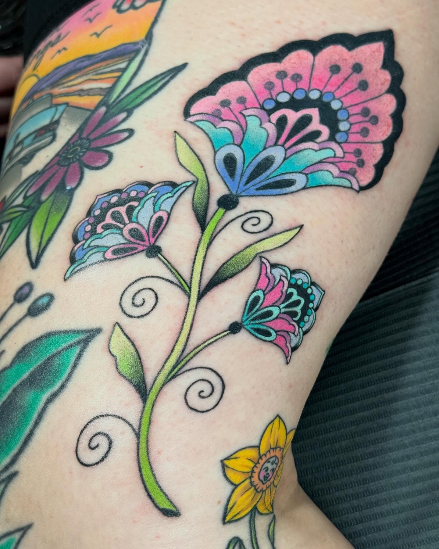 Floral arrangement American traditional tattoo on the forearm by Larkin Resler