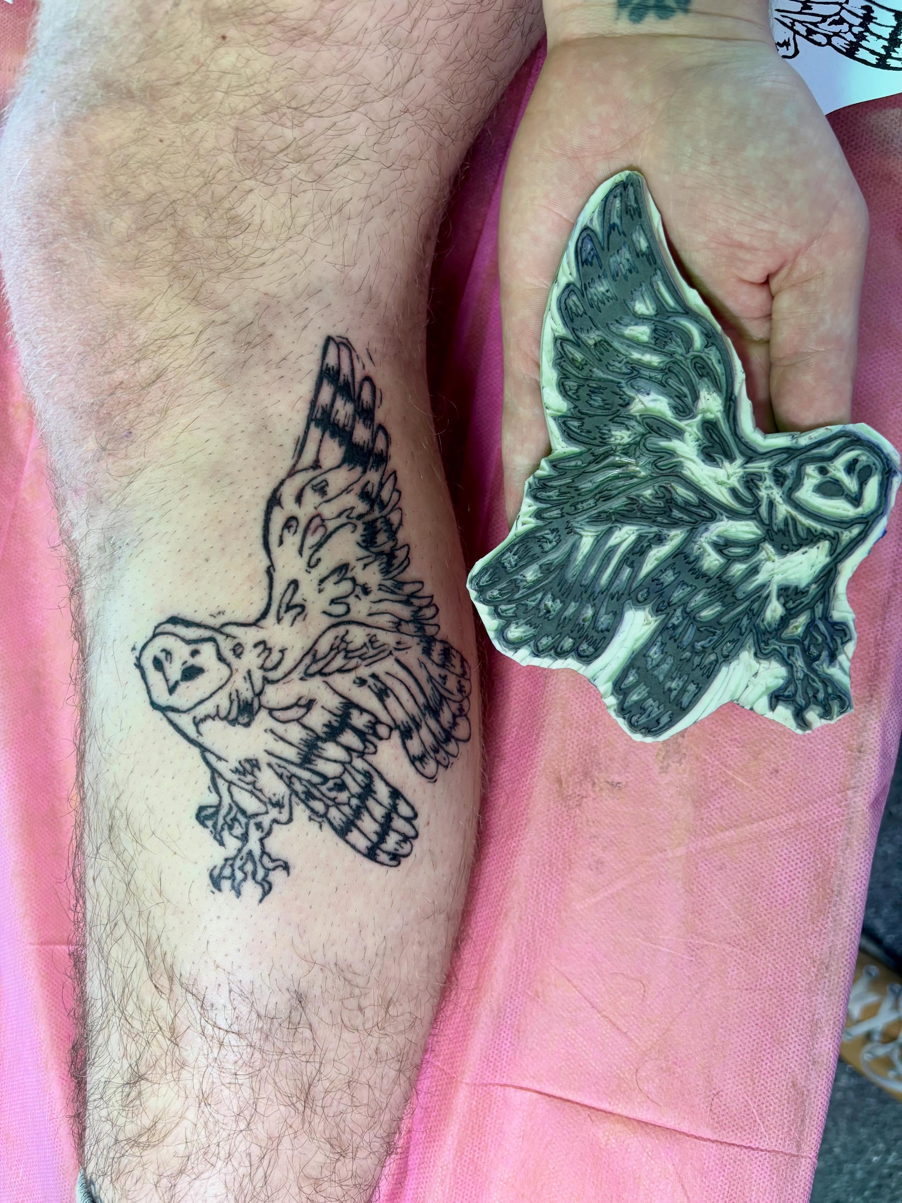 Owl black and grey tattoo on the forearm by Hiro Robinson