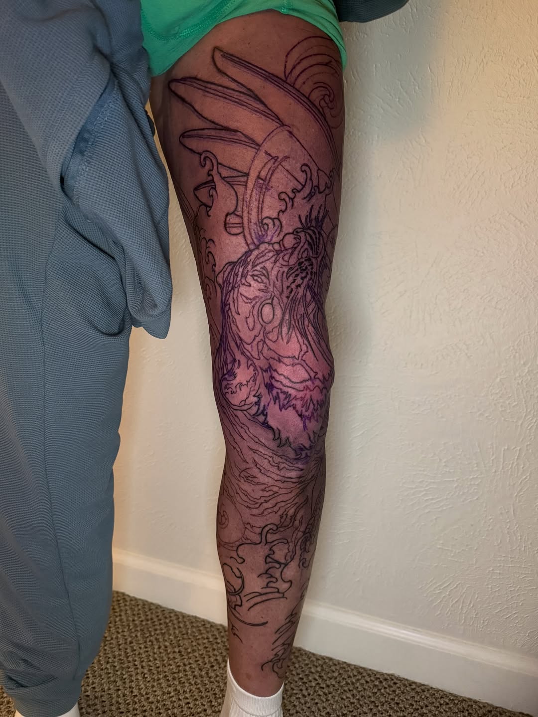 Tiger and waves sketch tattoo on the thigh by Mike Nance