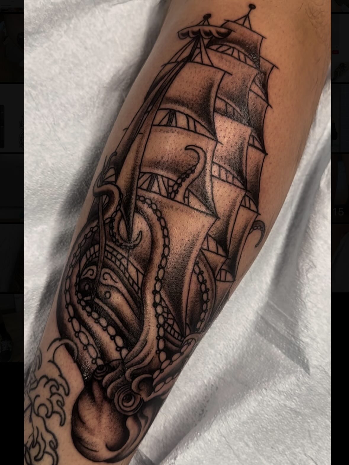 Ship and octopus realism tattoo on the forearm by Kaylee Woods