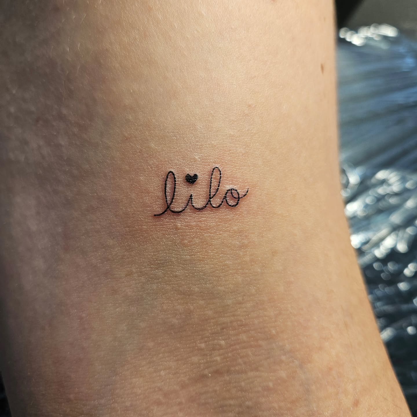 Tattoo by @carolynxriot.tattoos — lettering_script