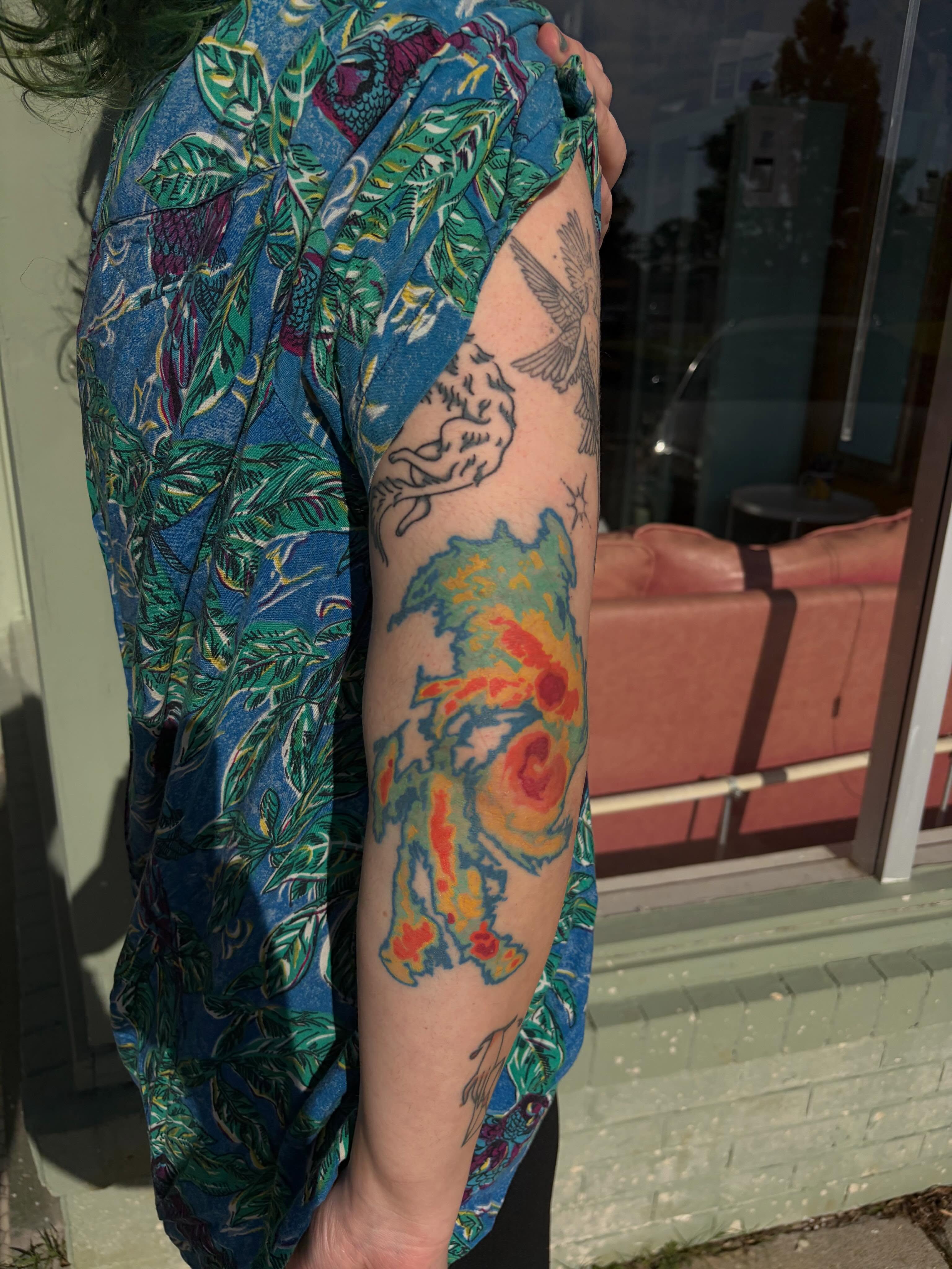 Abstract floral new school tattoo on the forearm by neal