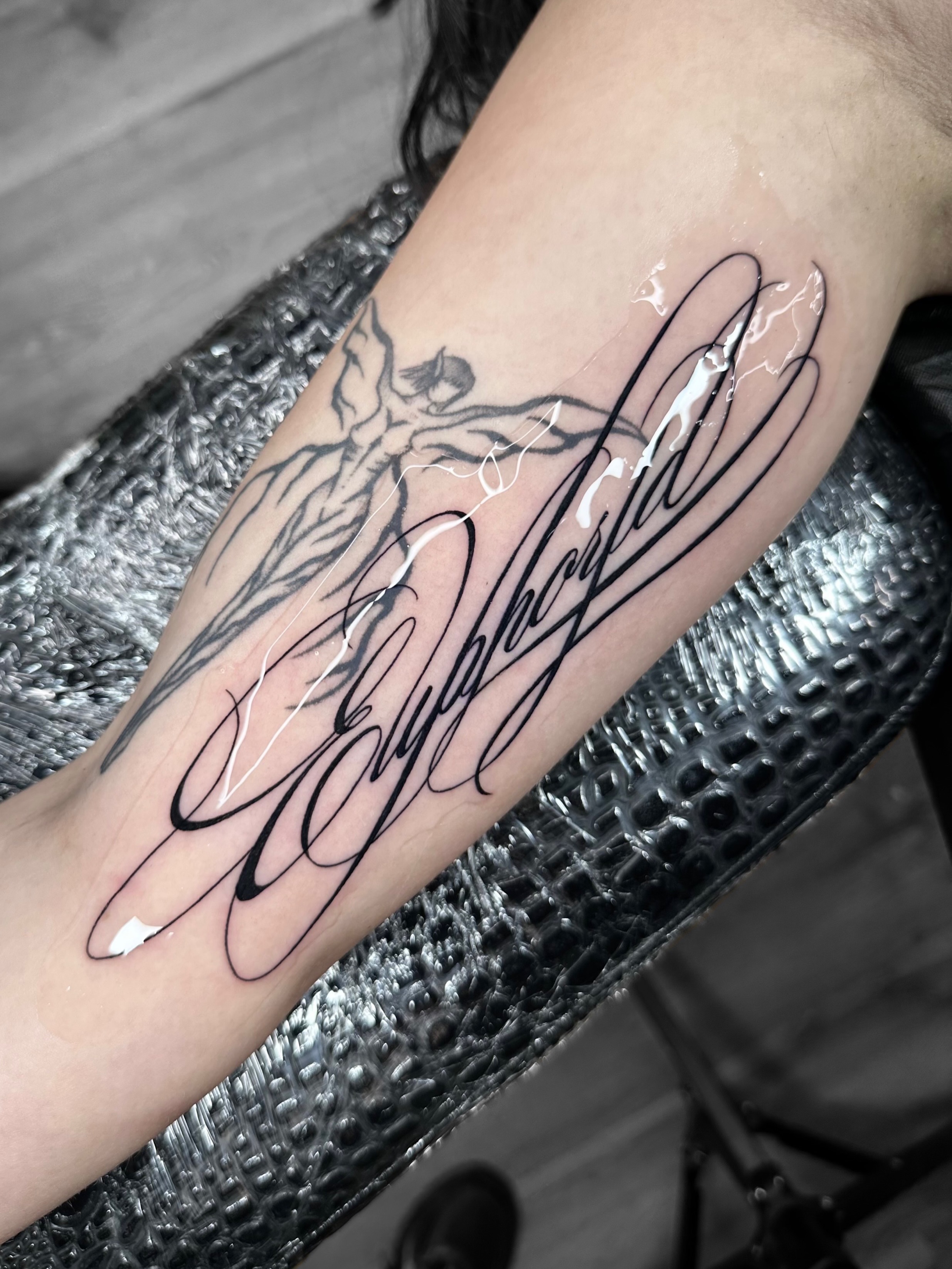 Script lettering lettering script tattoo on the forearm by Brooklyn Bailey