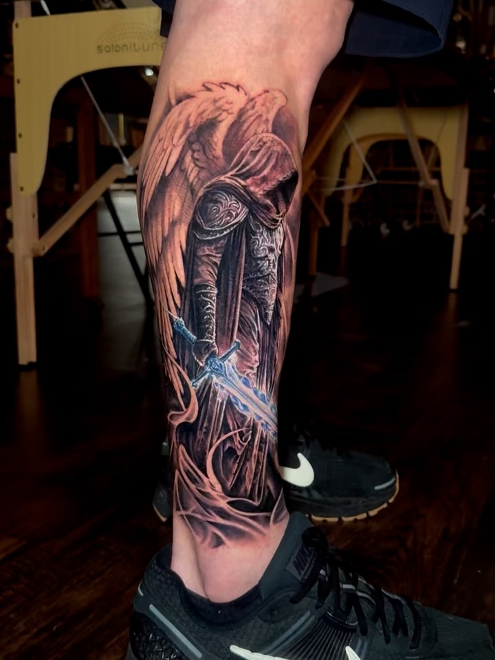 Angelic warrior realism tattoo on the calf by Gary Barrera