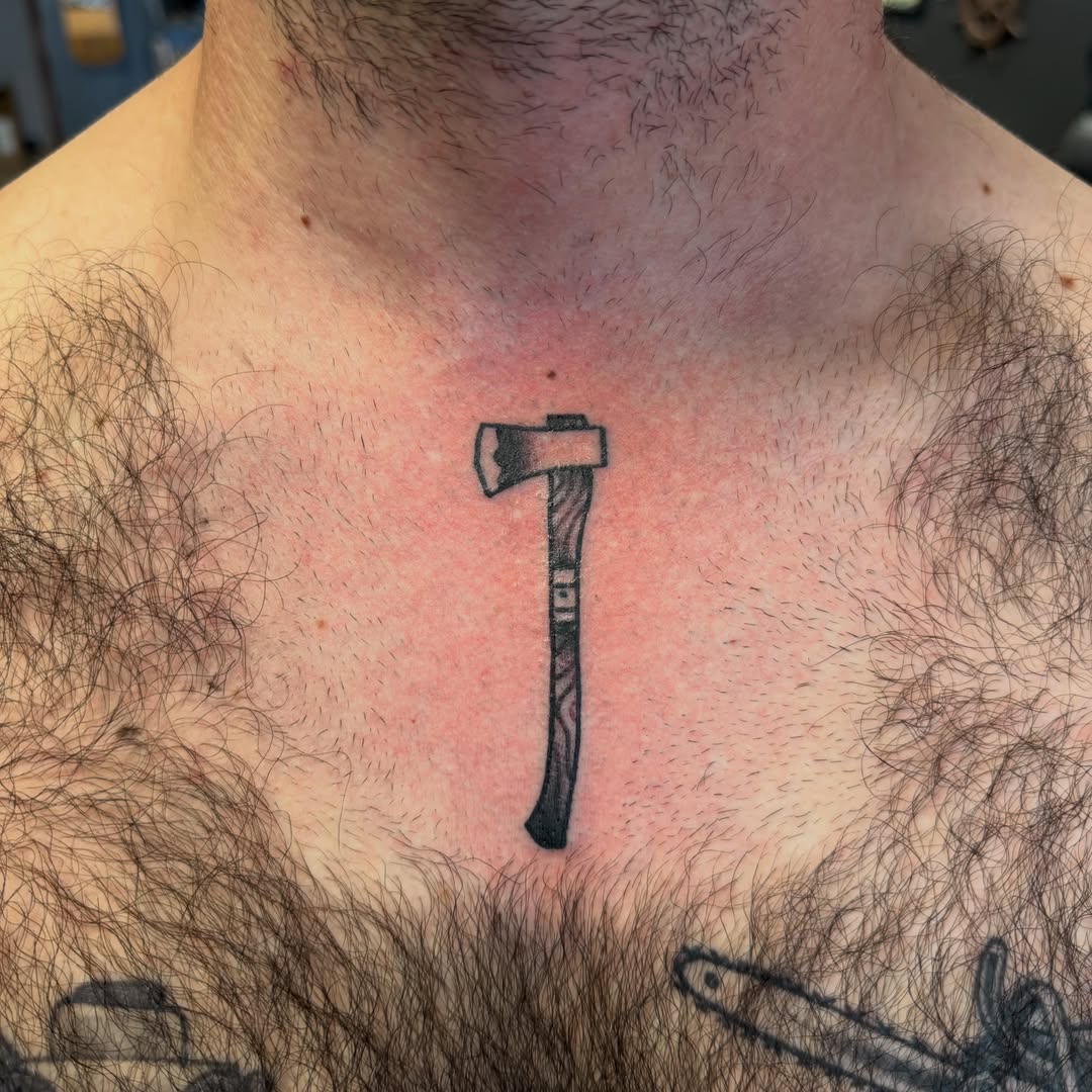 Axe black and grey tattoo on the chest by Kane L, Albuquerque, New Mexico