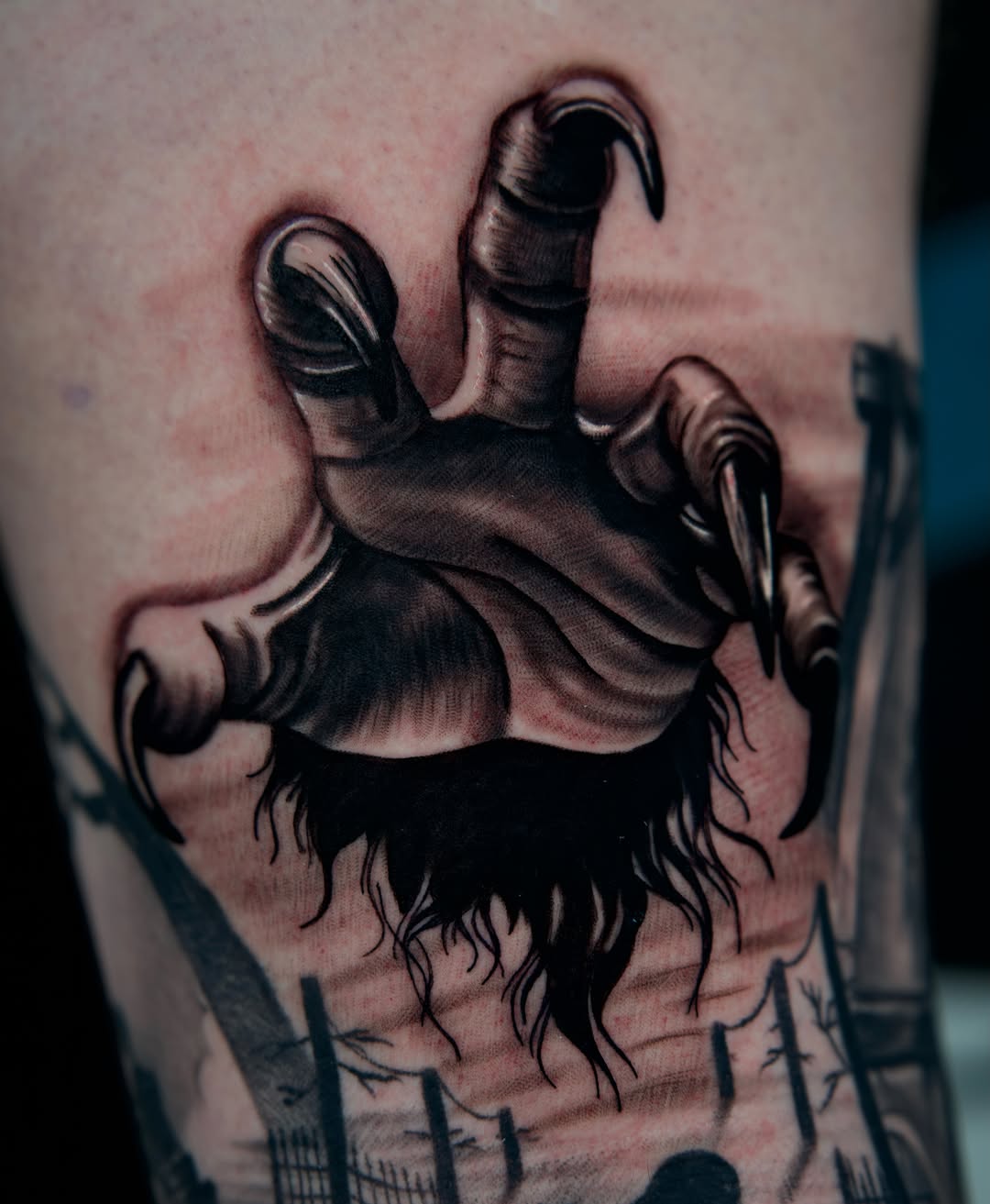 Monster hand reaching out surrealism tattoo on the forearm by Travis