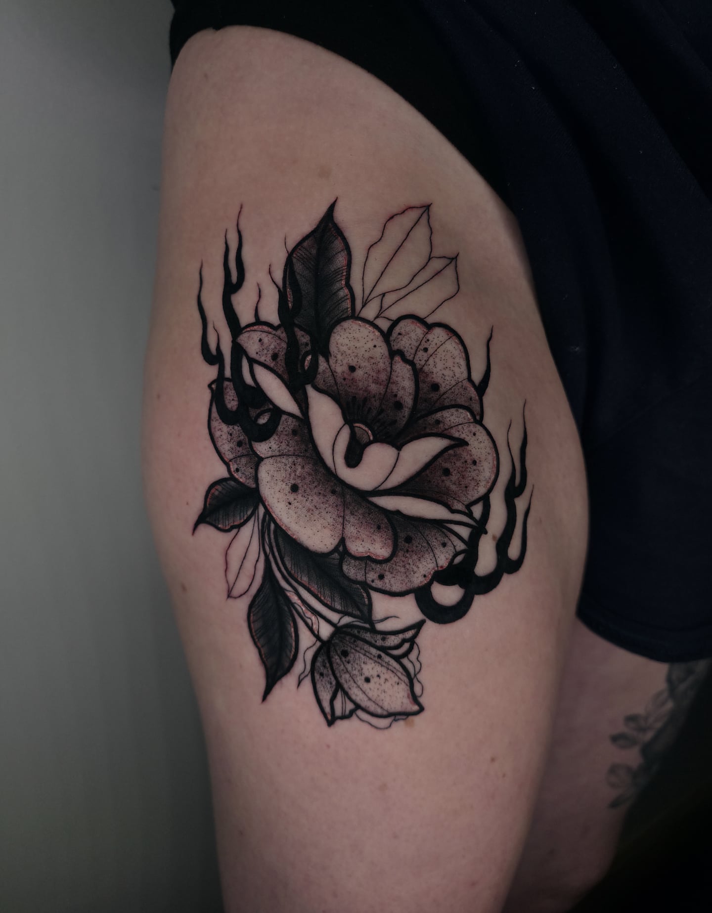 Flaming rose dotwork tattoo on the thigh by ☻ Addie