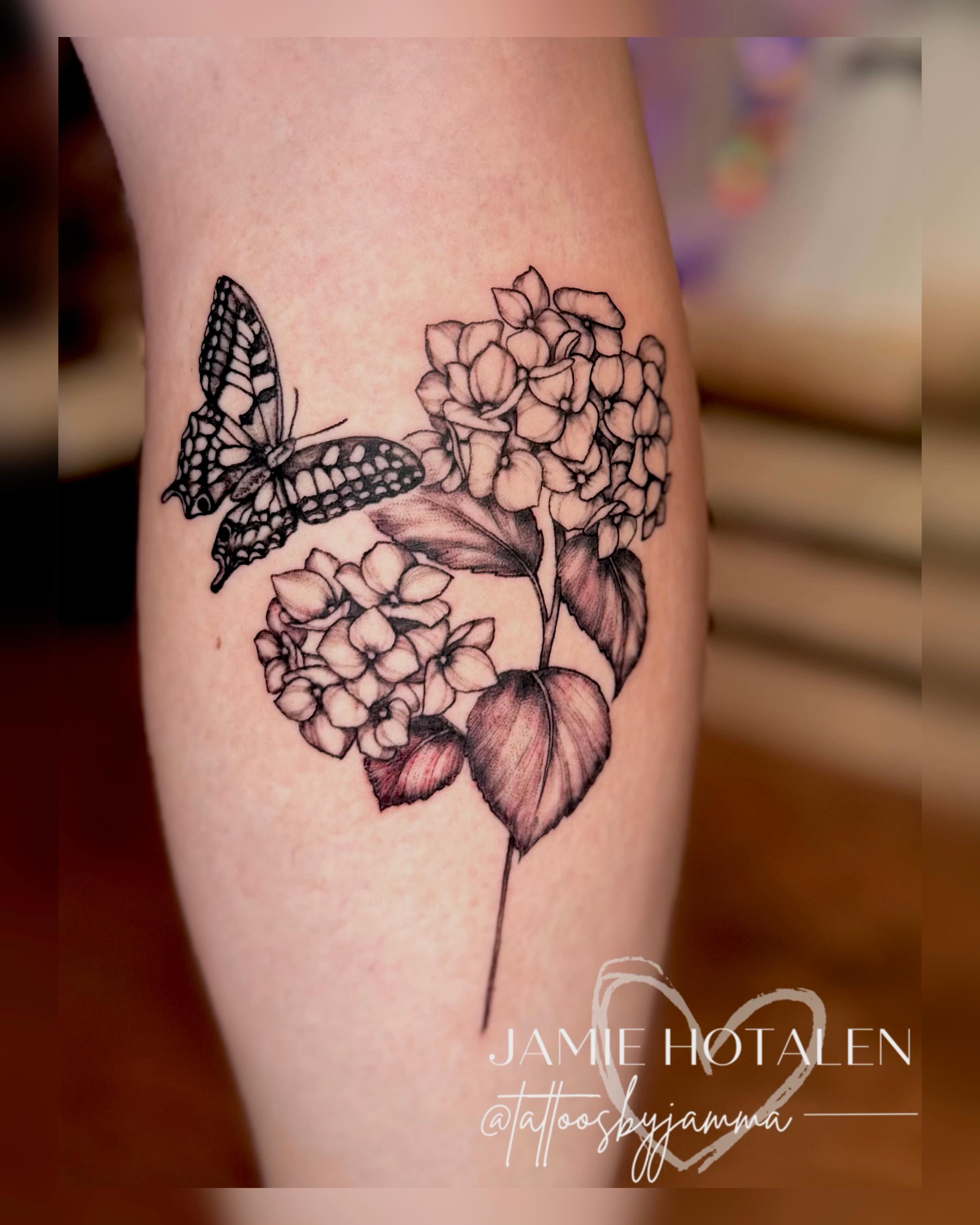 Hydrangea and butterfly realism tattoo on the forearm by πππππππ π½π² ππππππ π°πππππ π πΉππππ π·ππππππβ¨