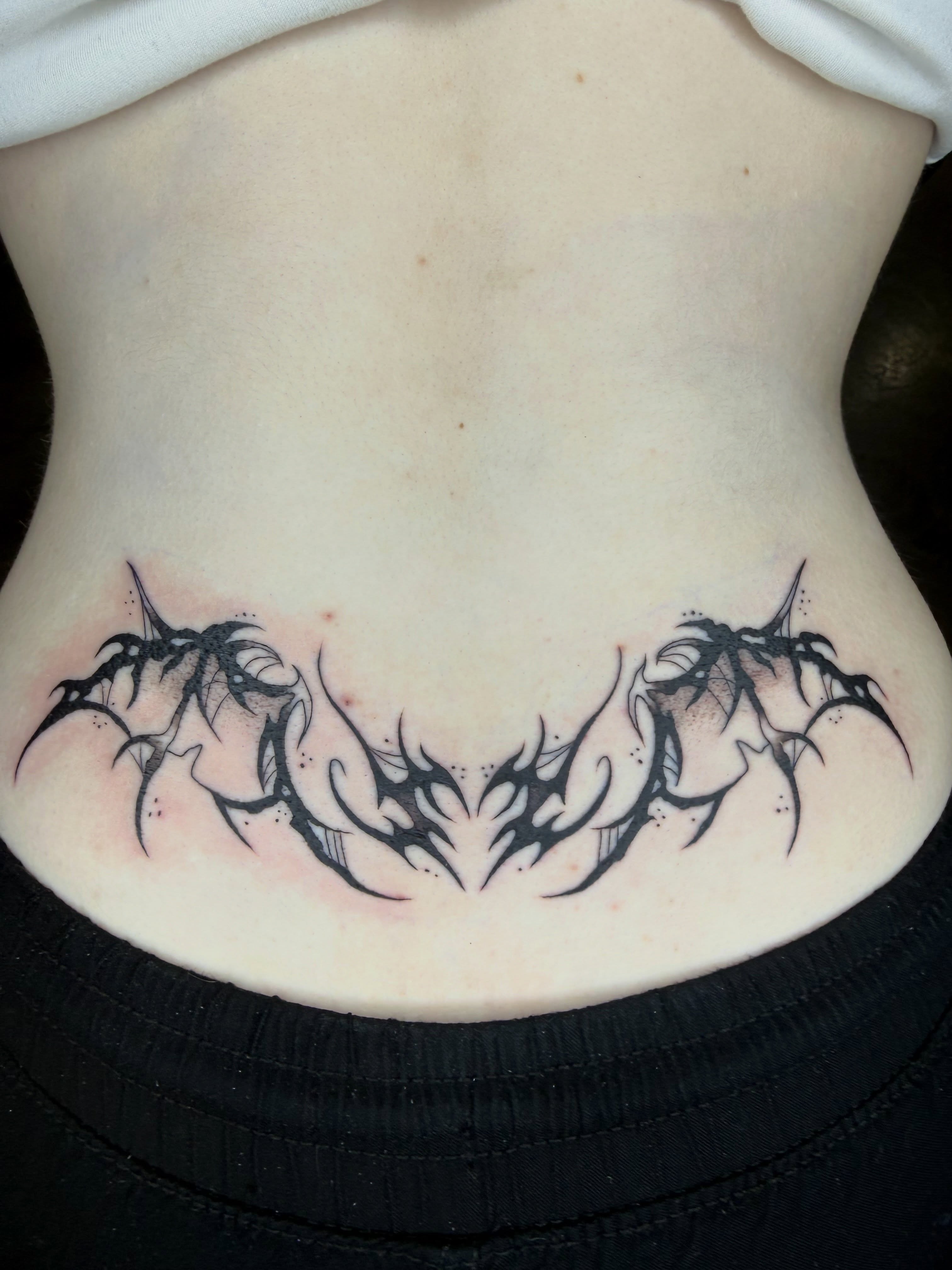 Tribal design tribal tattoo on the torso by @chrisskon, Carpentersville, Illinois