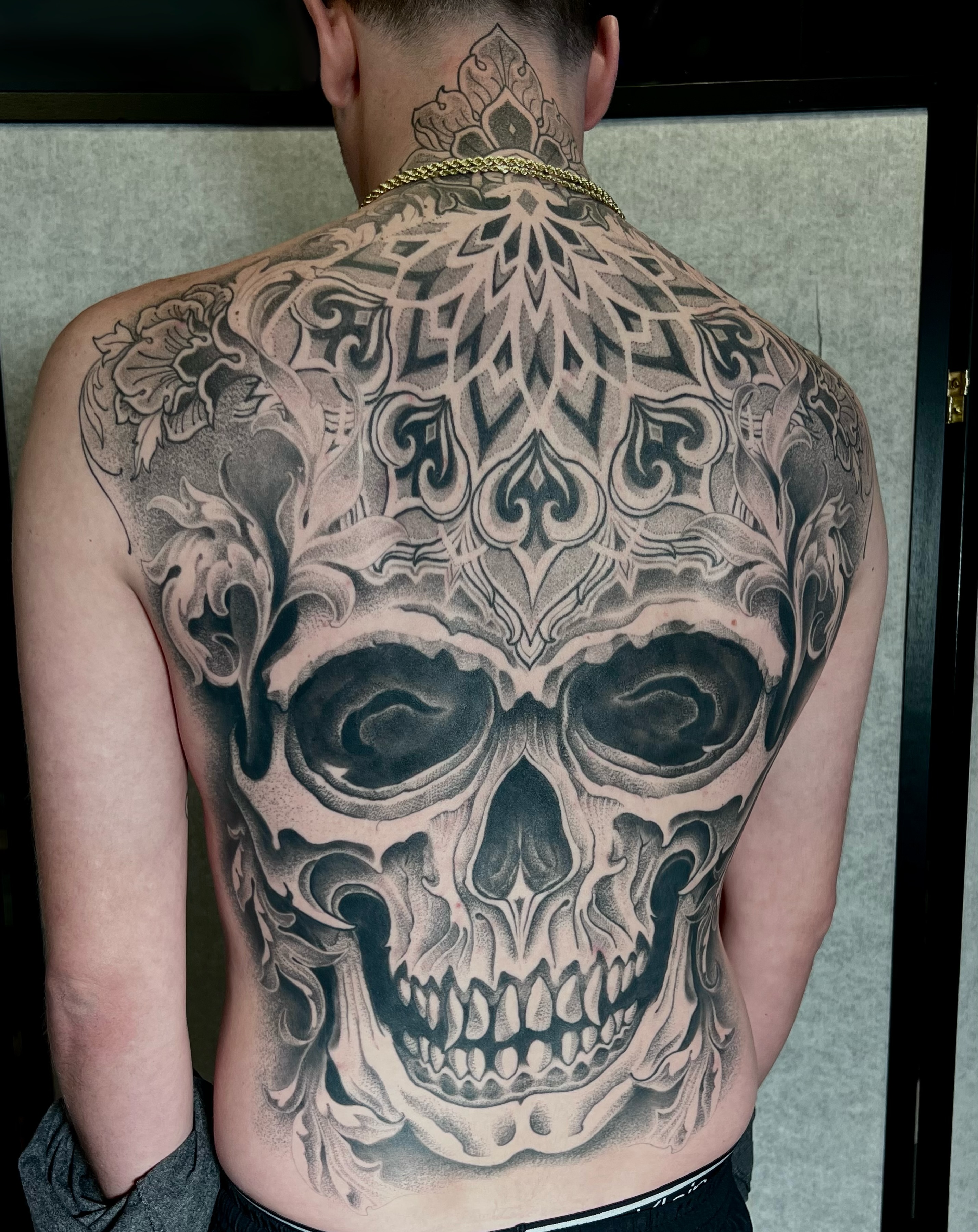 Tattoo by @woodrowtattoo — black_and_grey, realism