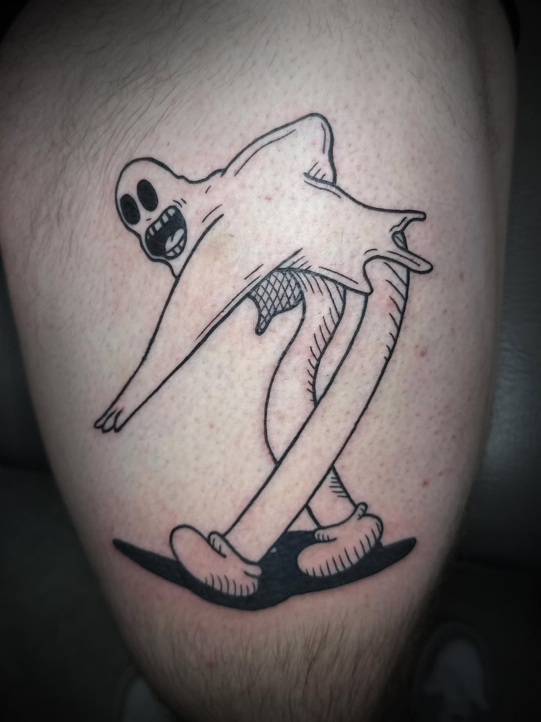 Cartoon ghost surrealism tattoo on the thigh by sᴋᴇᴛᴄʜᴇᴅ