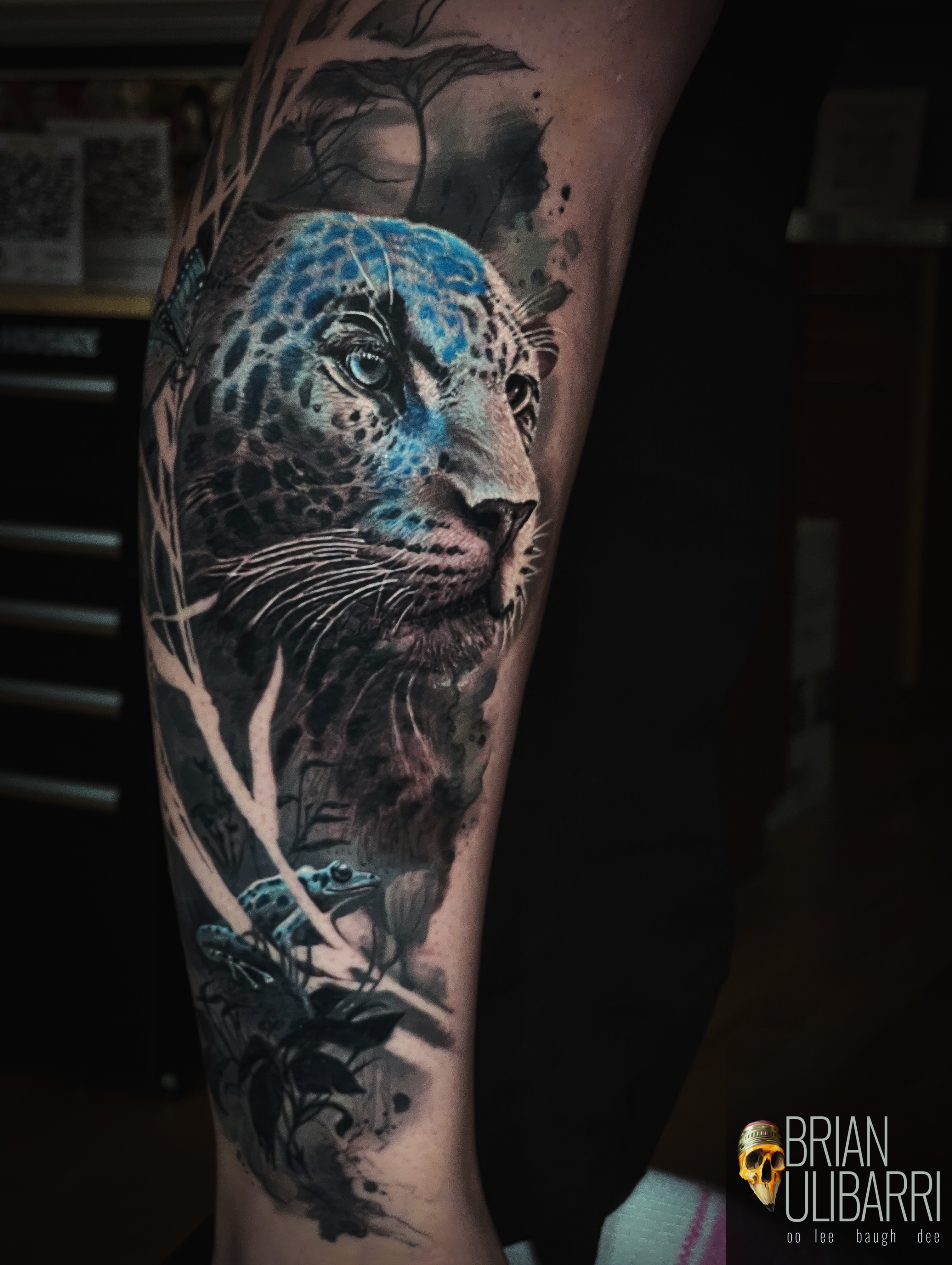 Leopard realism tattoo on the forearm by Brian Ulibarri