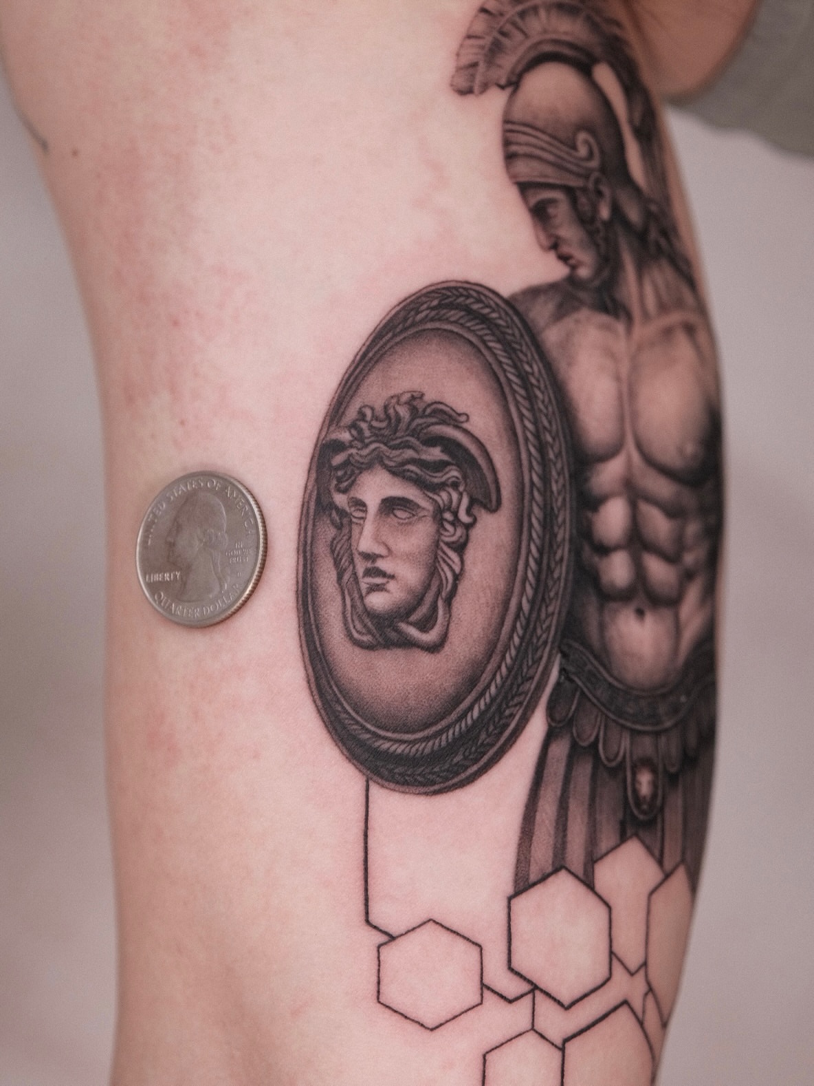 Medusa head cameo geometric tattoo on the forearm by Houston Tattoo Artist GoldenK