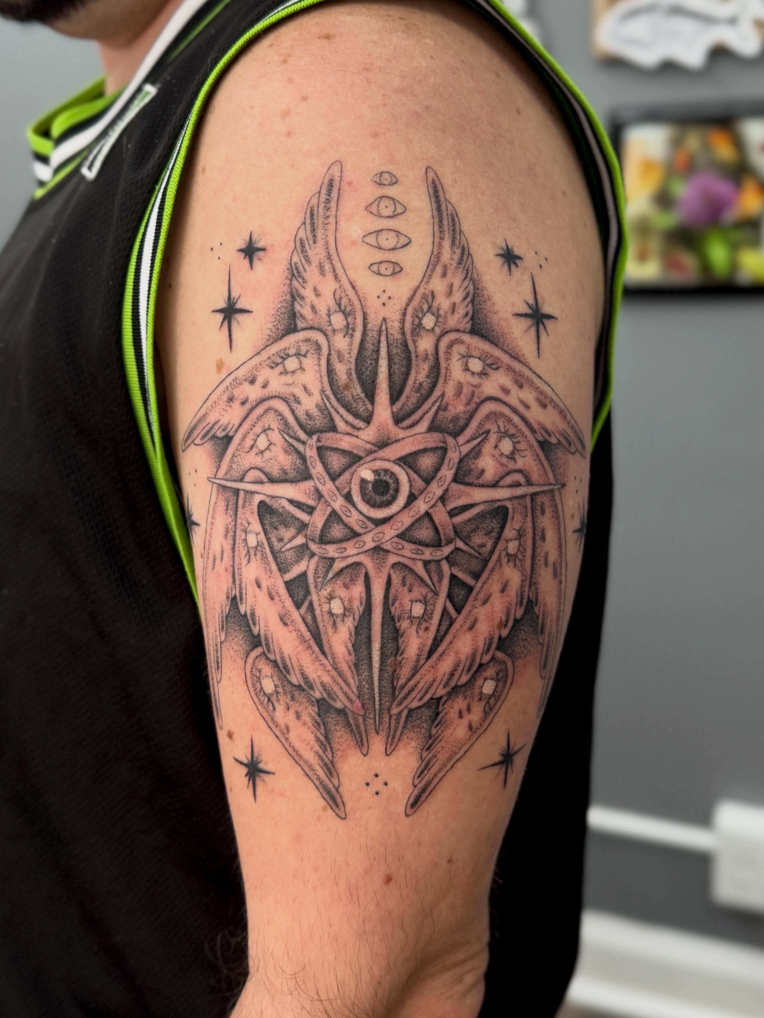 Pentagram with wings geometric tattoo on the forearm by Kamakana Pankiwska