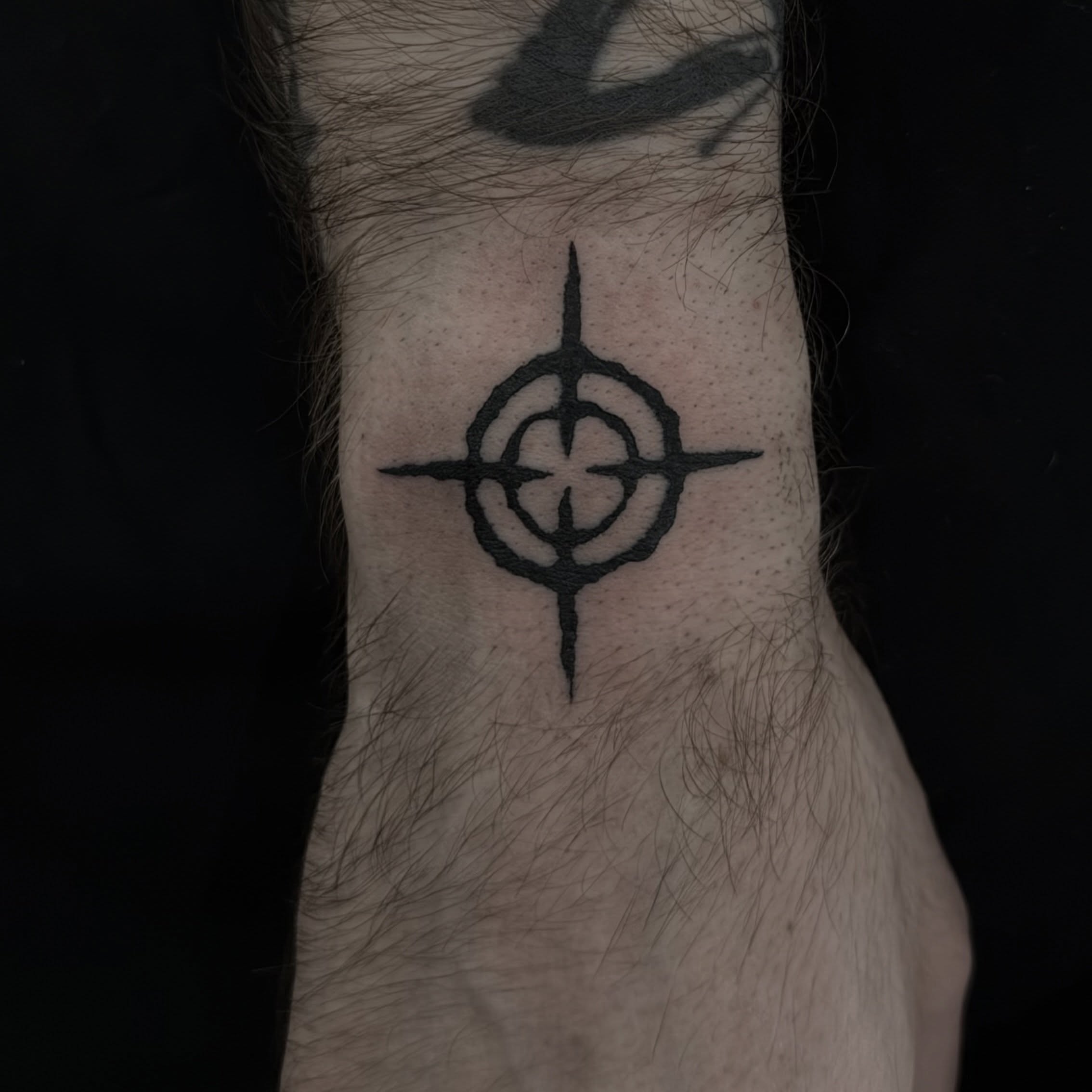 Compass geometric tattoo on the forearm by Casper Tattoos Toronto