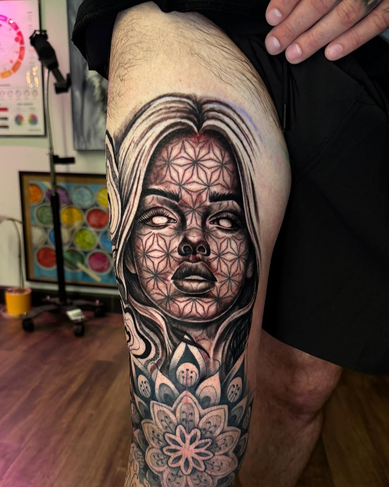 Geometric woman geometric tattoo on the thigh by Chad Meado