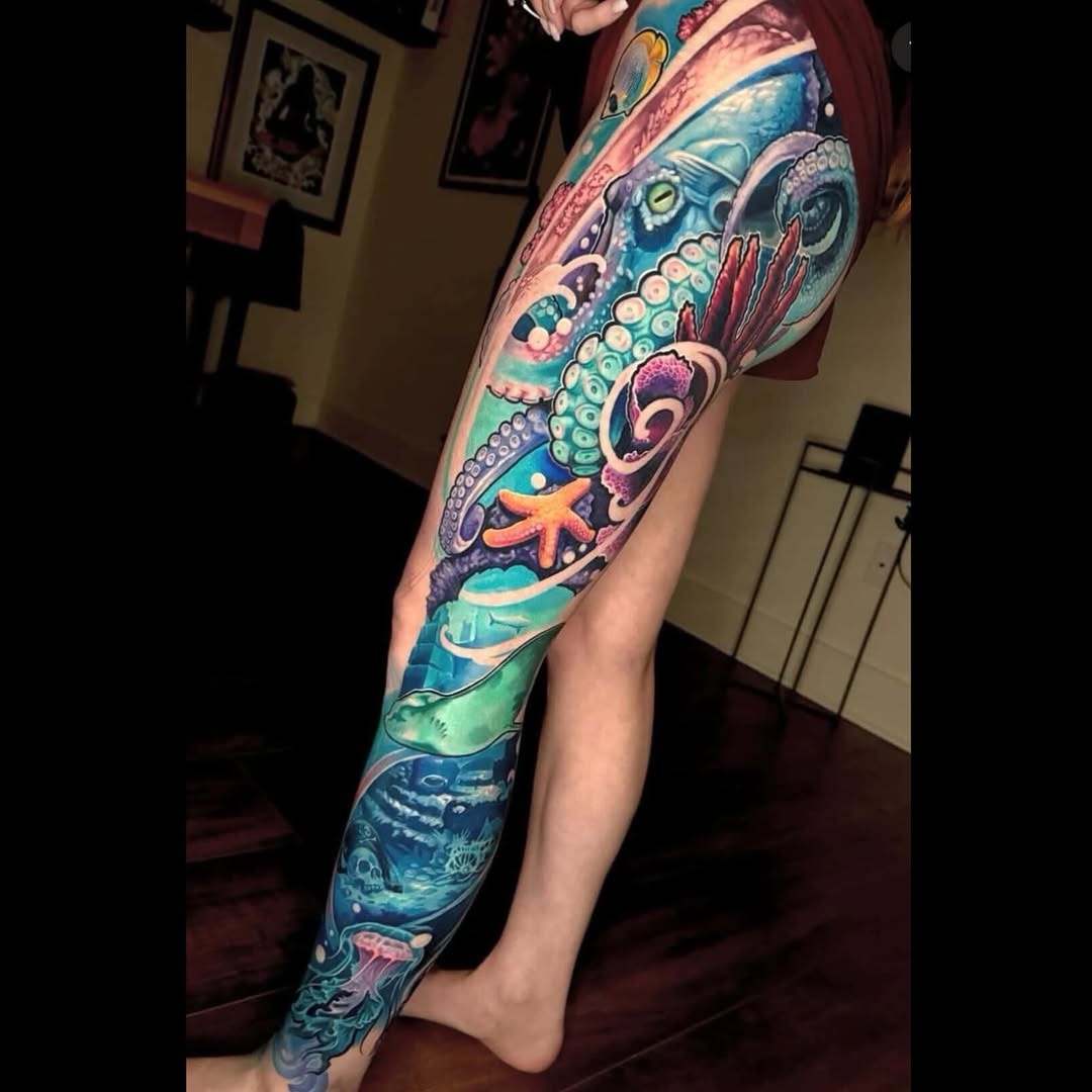 Underwater scene with octopus Japanese tattoo on the leg by Sean Flood