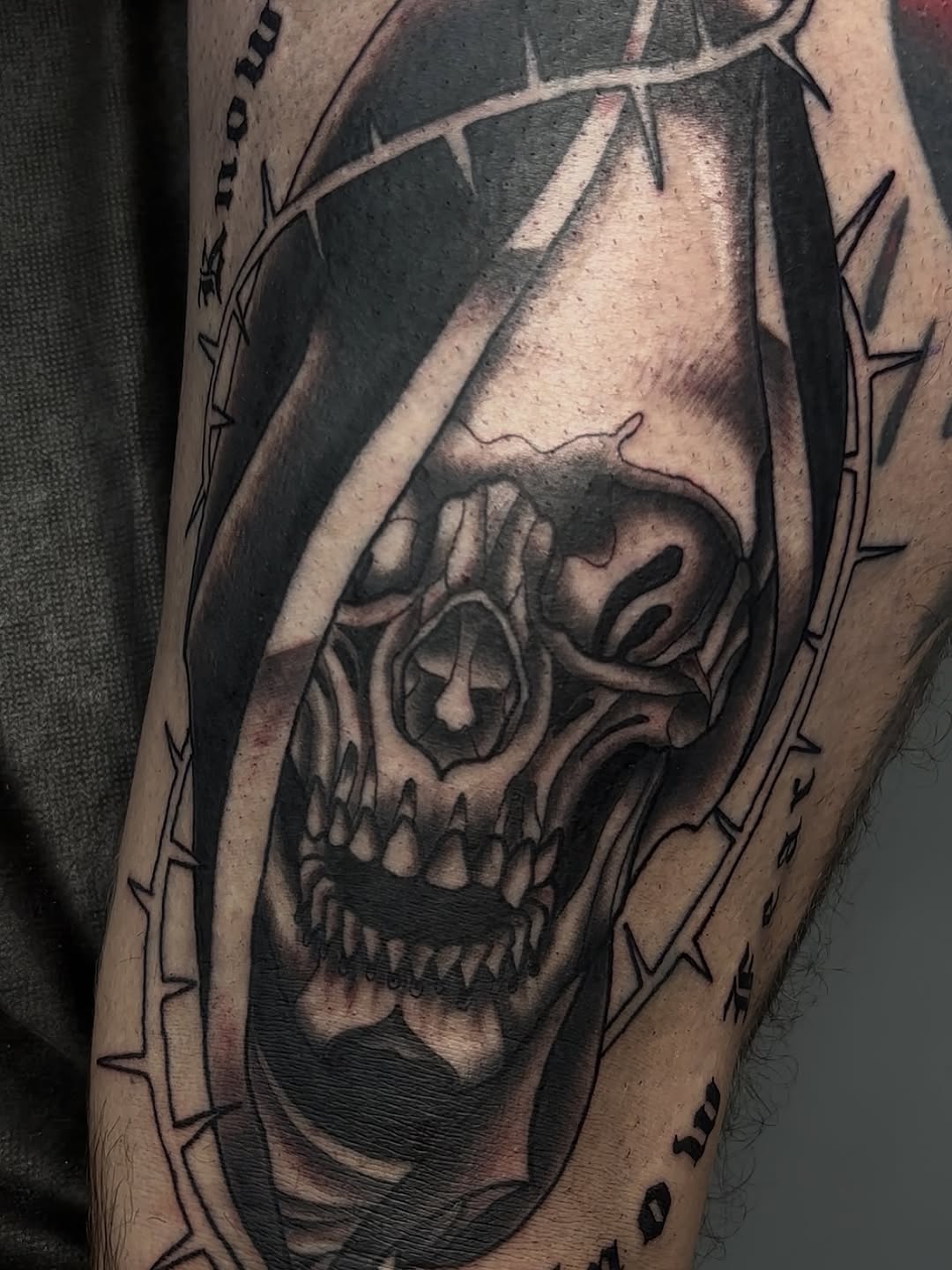 Tattoo by @trawlinson_tattoos — black_and_grey, dark_realism
