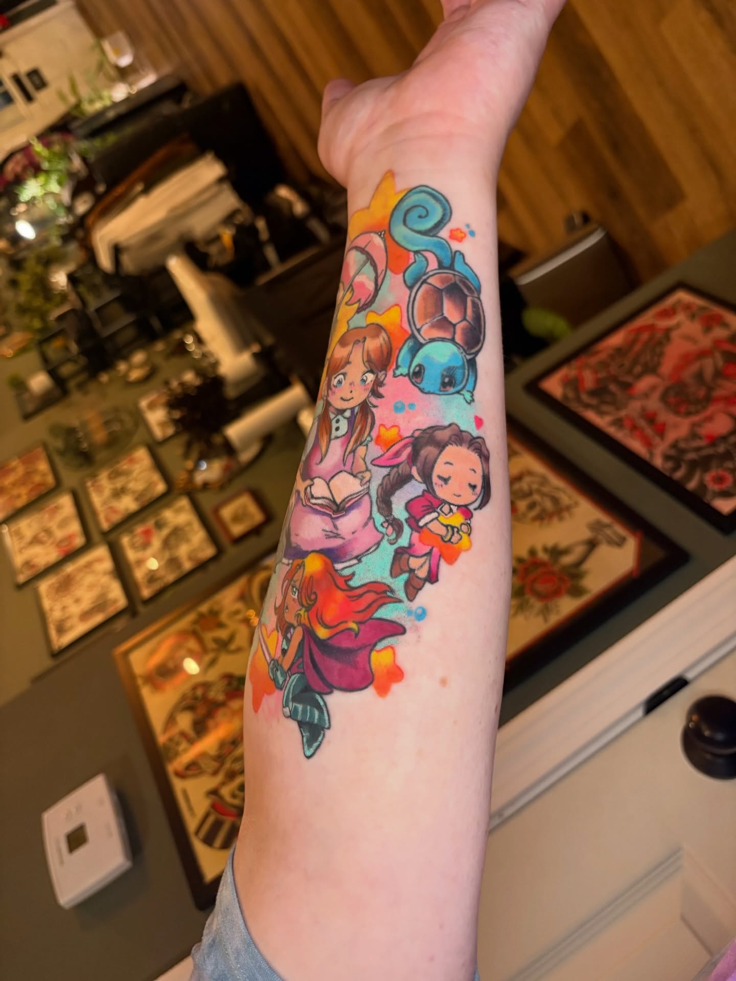 Anime characters anime tattoo on the forearm by Callum