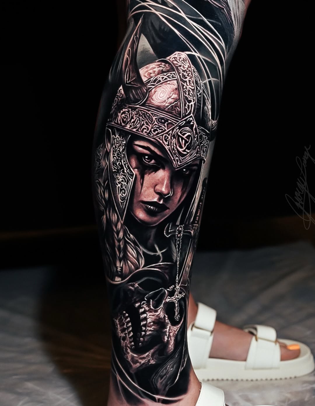 Viking woman and skull realism tattoo on the forearm by George Lange