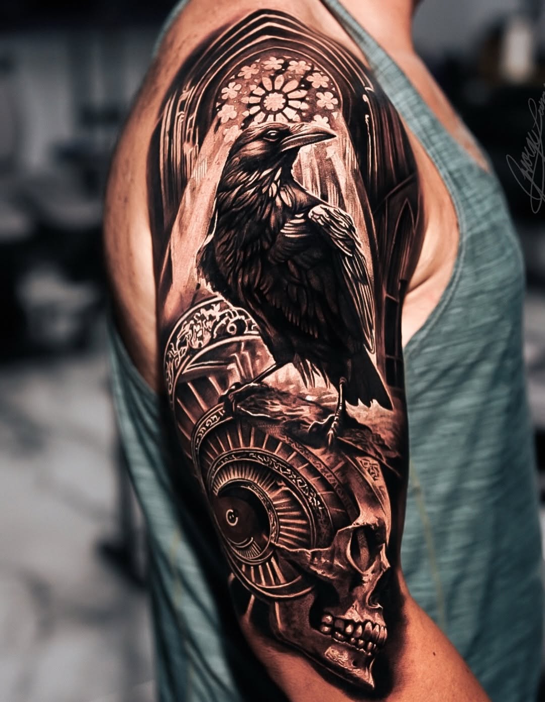 Realism tattoo on the upper arm by George Lange