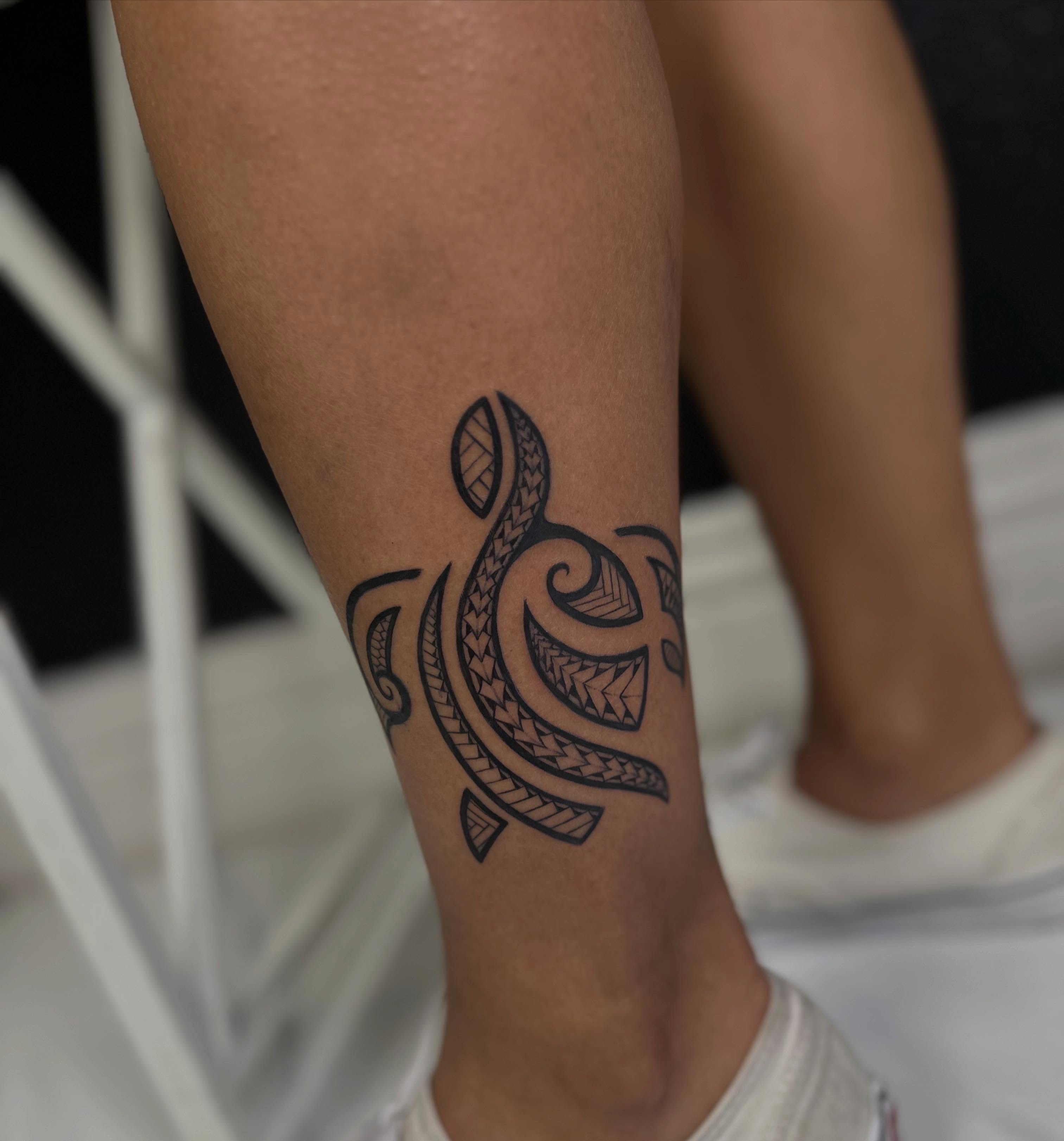 Turtle tribal tattoo on the forearm by Vicious Marc