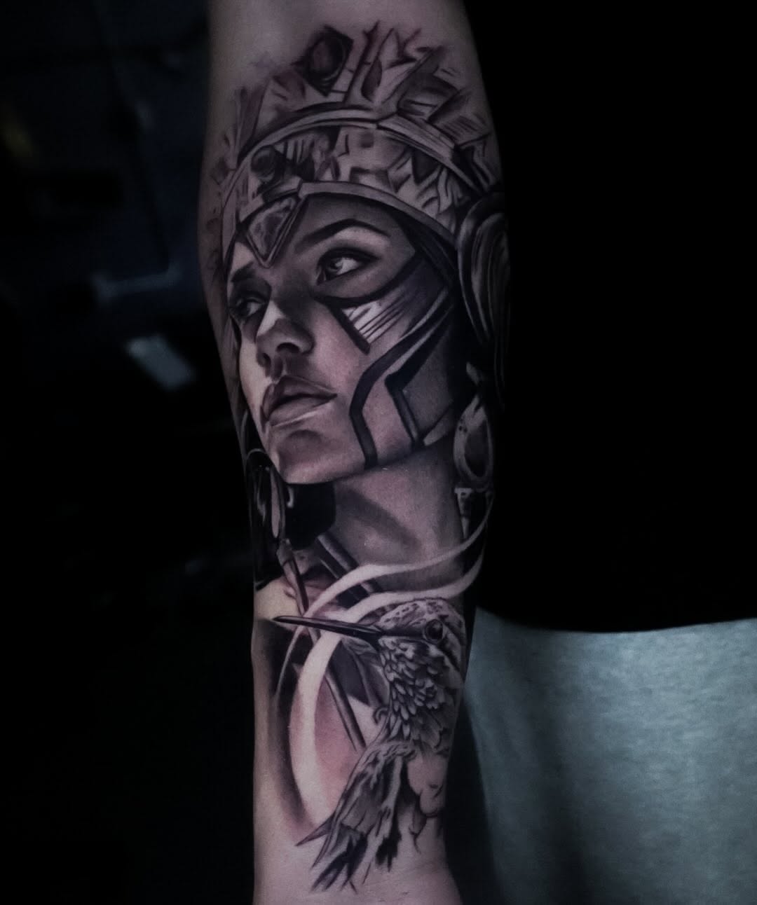 Woman with headdress and hummingbird realism tattoo on the forearm by ✝️ Nicholas Fernandez ✝️