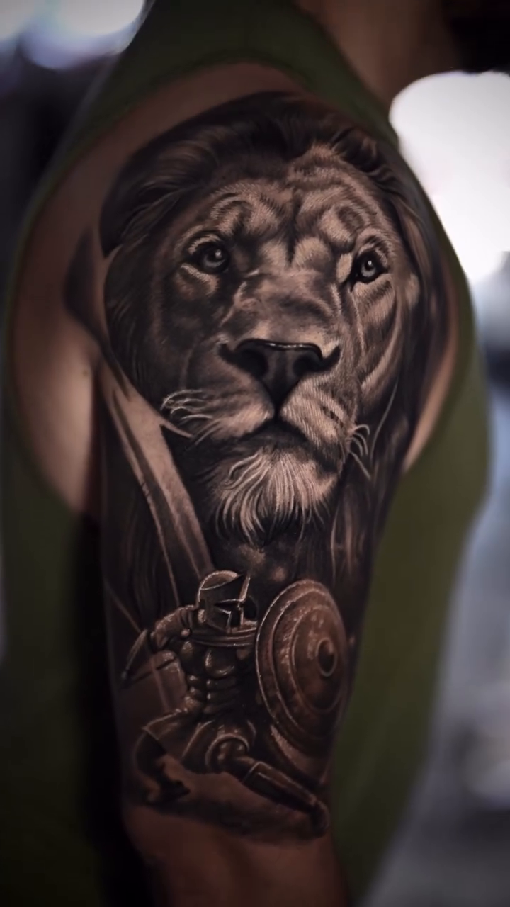 Lion with gladiator realism tattoo on the forearm by π¨π»βπ¨Ever luis Rivero π¨π»βπ¨
