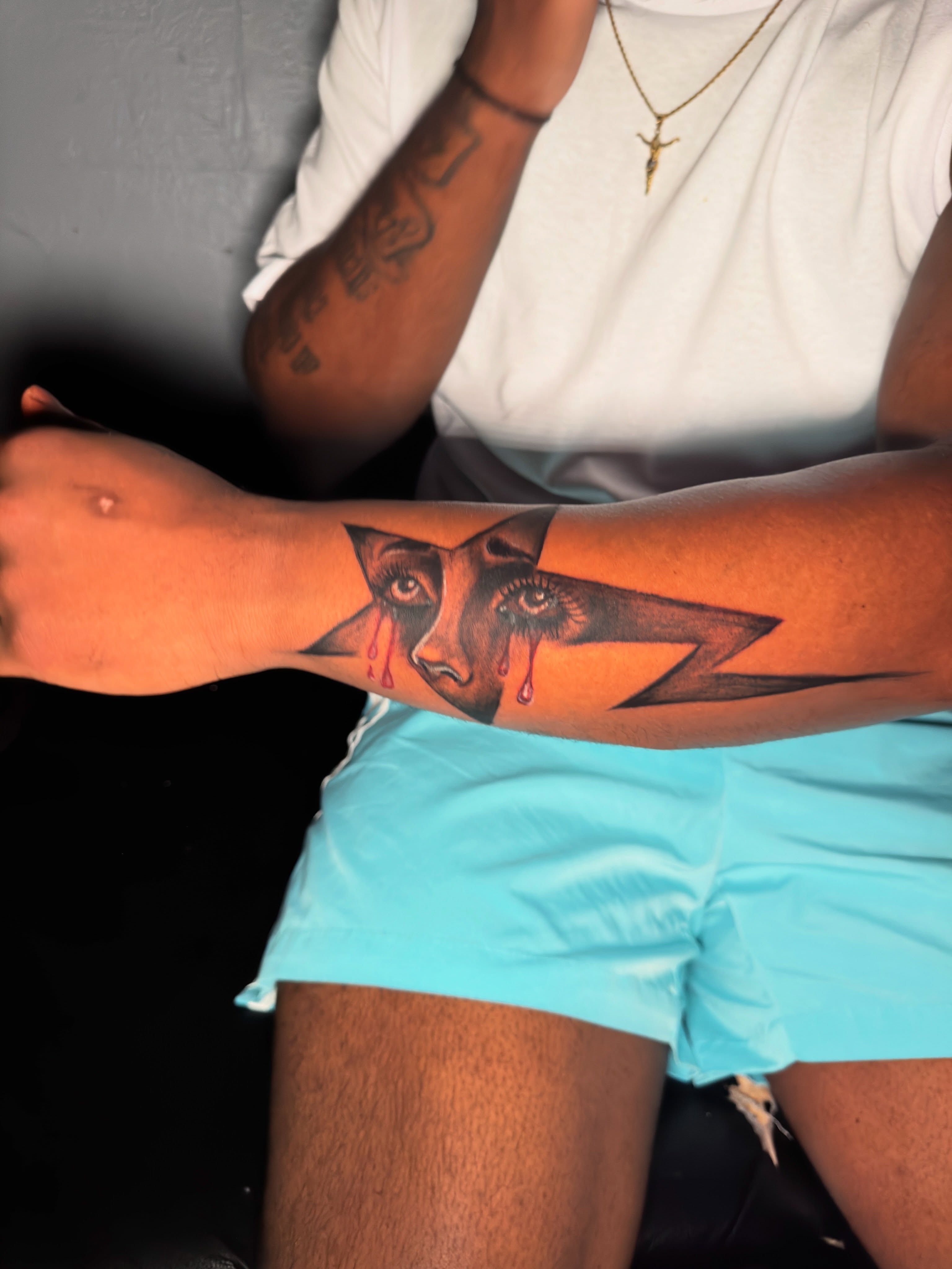 Eye with lightning bolt geometric tattoo on the forearm by dallas tattoo artist, Duncanville, Texas
