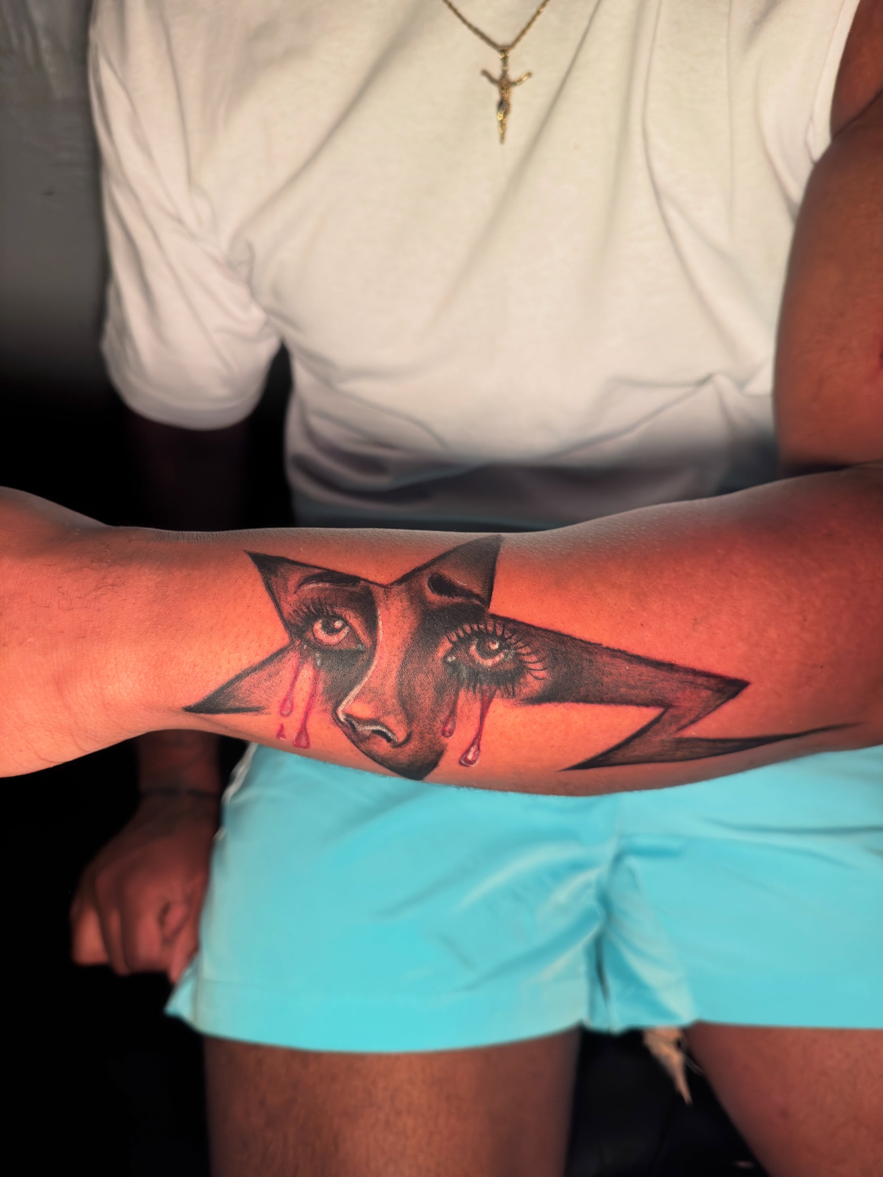 Tearful face realism tattoo on the forearm by dallas tattoo artist, Duncanville, Texas