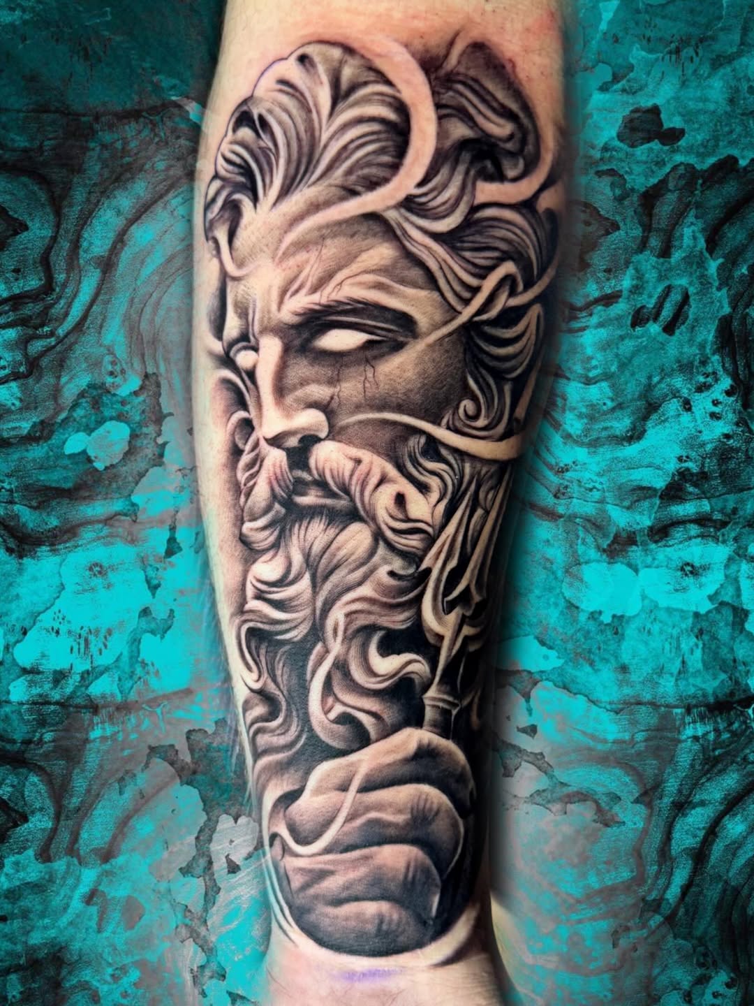 Greek god portrait with trident Japanese tattoo on the forearm by Luis Chauta