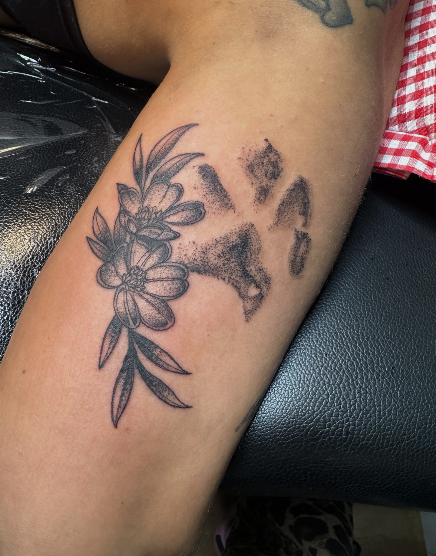 Flower dotwork tattoo on the forearm by Saffron Florea, Tiffin, Ohio