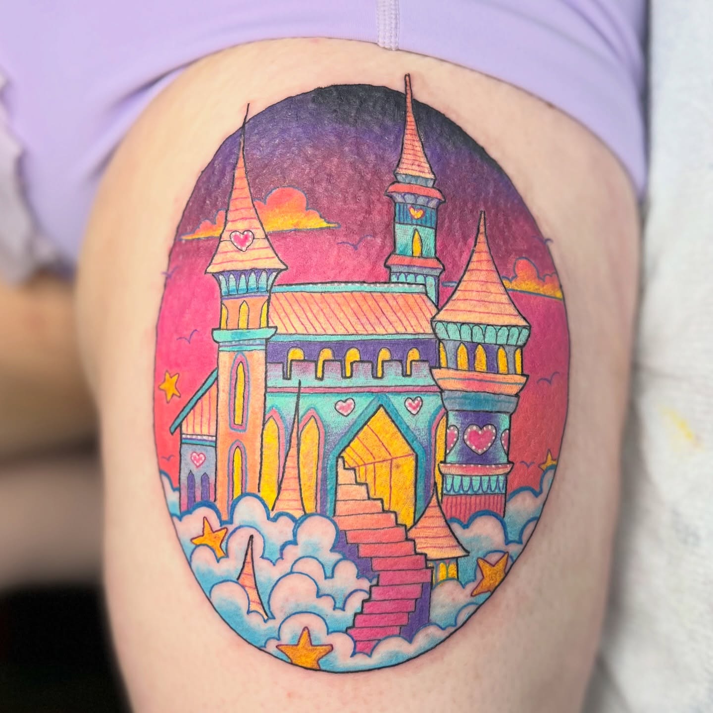 Castle illustrative tattoo on the thigh by Alex Santaloci