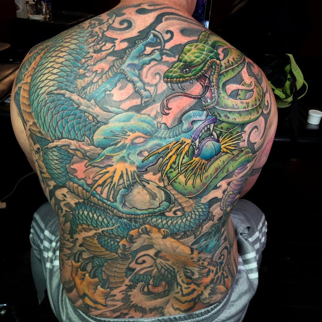 Dragon, snake, and tiger Japanese tattoo on the back by Jake Goss, Salt Lake City, Utah
