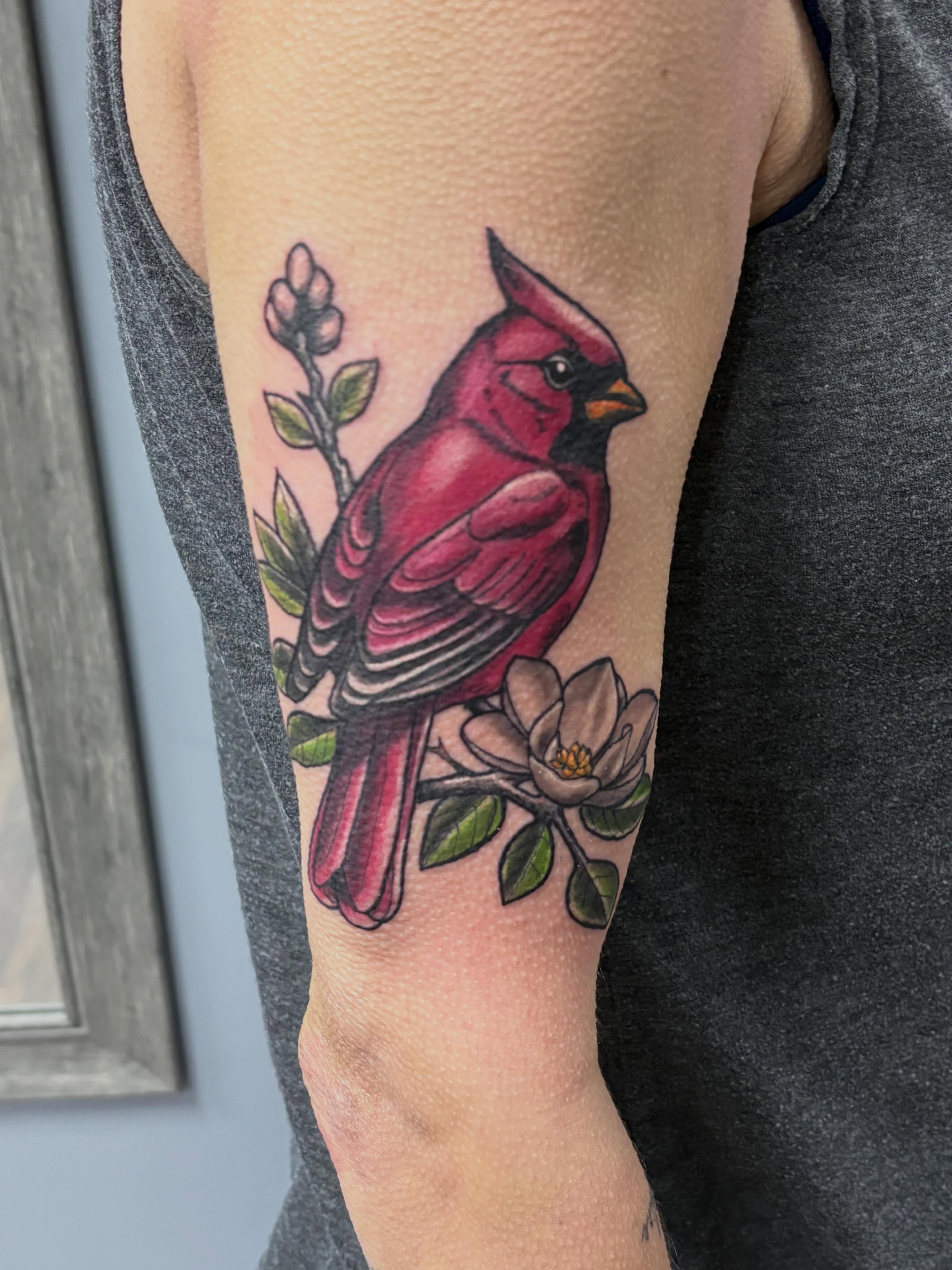 Cardinal bird American traditional tattoo on the forearm by Jack Ferreri